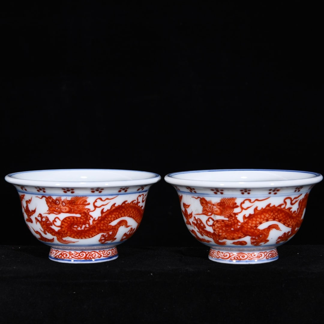 A Pair of Exquisite Blue and White Iron-Red Glazed Auspicious Cloud and Dragon Pattern Cups: A Pair of Exquisite Blue and White Iron-Red Glazed Auspicious Cloud and Dragon Pattern Cups,Ming Dynasty, China,Yongle Four-character Mark,Size:2inx3.5in一对青花矾红