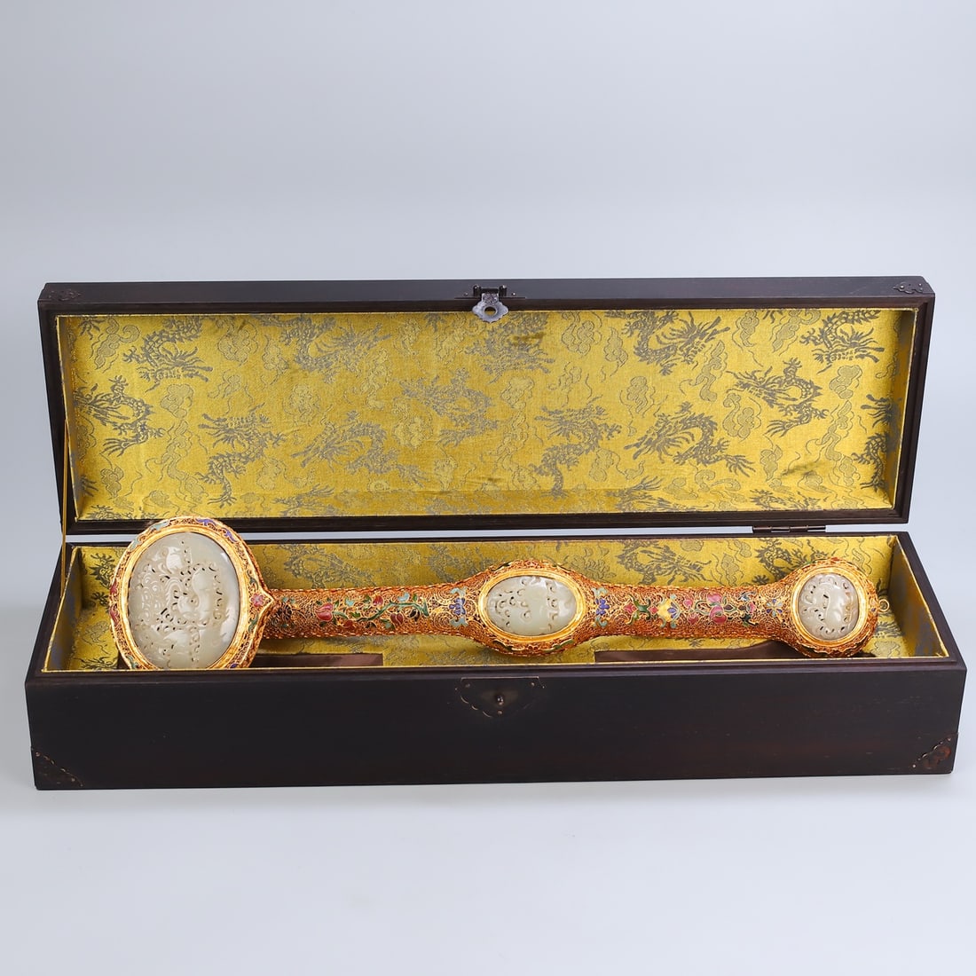 A Huge Filigree and Gilding Inlaid White Jade Sheep Pattern Ruyi: A Huge Filigree and Gilding Inlaid White Jade Sheep Pattern Ruyi,Qing Dynasty,China,Qianlong Four-character Mark,Size:(Box)22.4inx4.7in,(Ruyi)20.1inx4.7in花丝鎏金镶௙