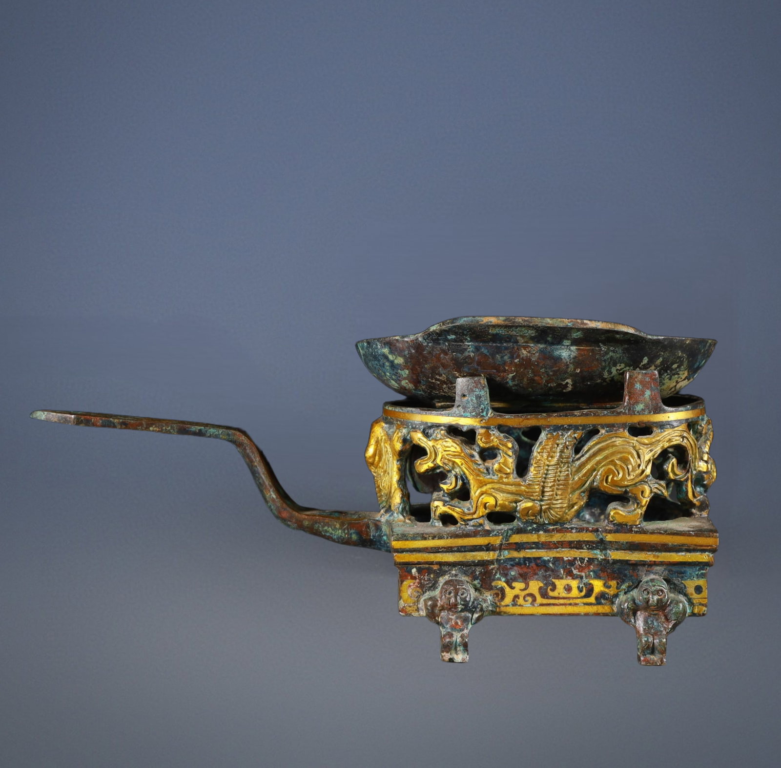 A Exquisite Gold-Inlaid Bronze Beast-Face Pattern -With Inscription Ornament: A Exquisite Gold-Inlaid Bronze Beast-Face Pattern -With Inscription Ornament Han Dynasty, China Size:9.8inx3.7inx4.3in Weight:900g青铜铭文错金温酒ࢤ