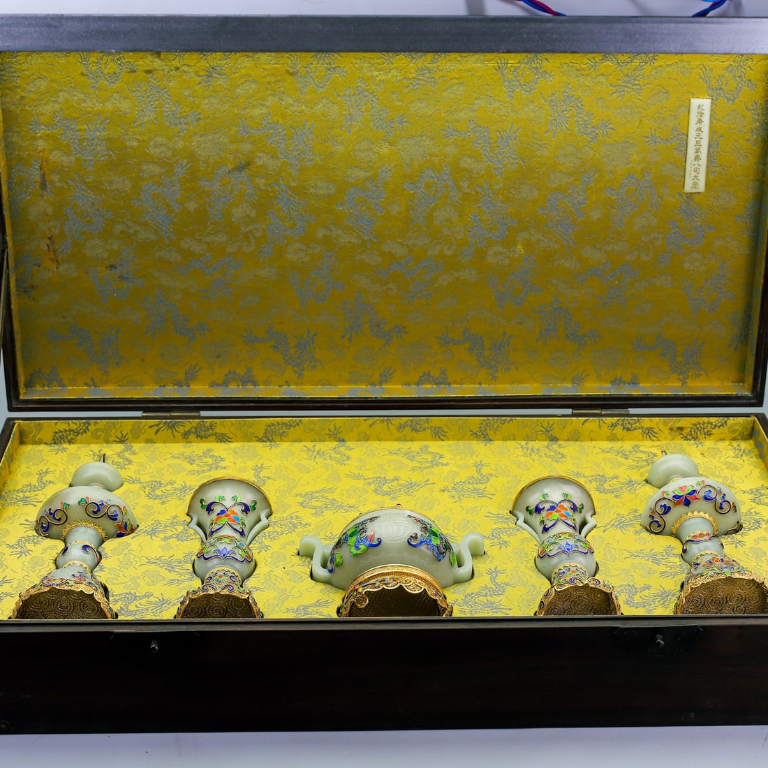 A Set of Rare Filigree and Gilding Inlaid White Jade Ornaments,Inlaid Gems: A Set of Rare Filigree and Gilding Inlaid White Jade Ornaments,Inlaid Gems,Qing Dynasty,China,Size:(Candlestick)12.4inx3.9in,(Vase)7.6inx3.2in,(Censer)6.1inx6.7inx4.9in,(Box)6.1inx31.5inx15.7in,Total 