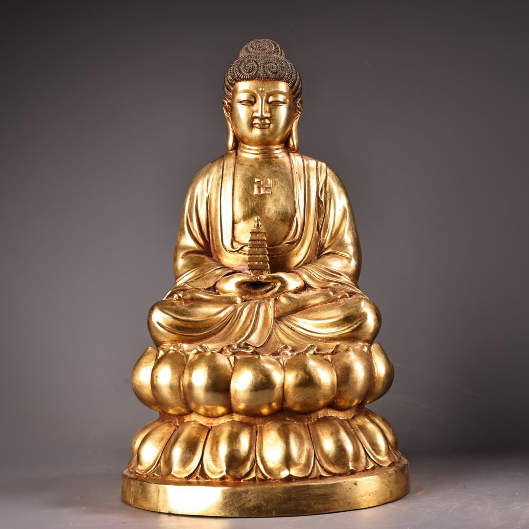 A Solemn Gilt Bronze Statue of Sakyamuni: A Solemn Gilt Bronze Statue of Sakyamuni,Ming Dynasty,China,Yongle Six-character Mark,Size:17.3inx9.1in,Weight:12000g铜鎏金如来像，中国明