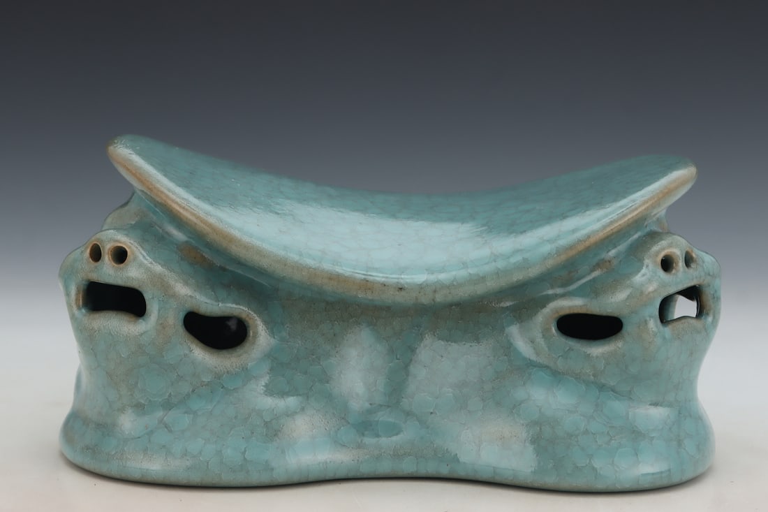 An Exquisite Ru yao Sky Blue Glazed Beast-Shaped Pillow,With an Imperial Poem by Emperor Qianlong: An Exquisite Ru yao Sky Blue Glazed Beast-Shaped Pillow,With an Imperial Poem by Emperor Qianlong,Song Dynasty,