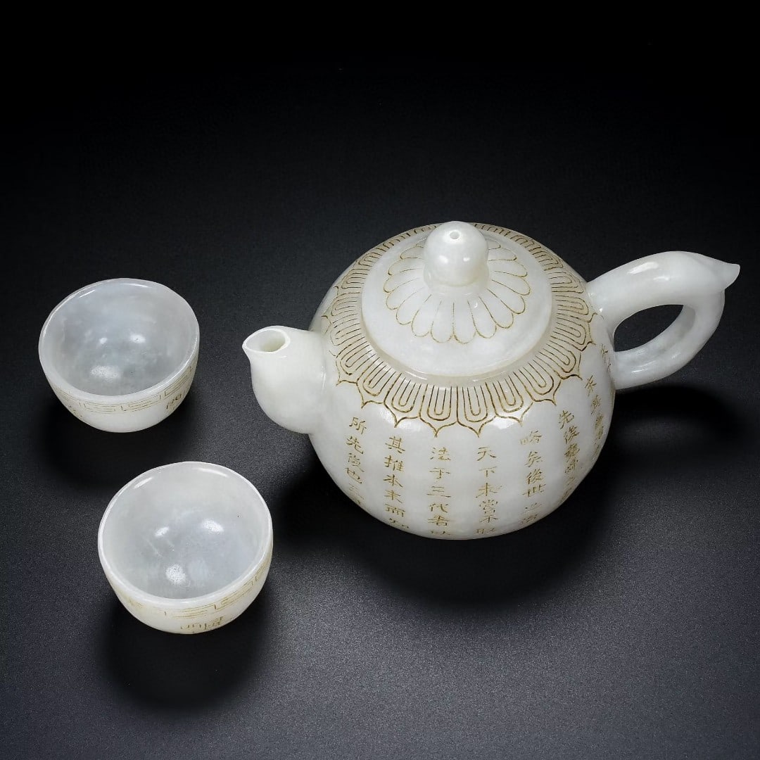 A Set of Fine White Jade Poem Teawares: A Set of Fine White Jade Poem Teawares,Qing Dynasty,China,Qianlong Four-character Mark,Size:(Ewer)3.9inx6.3inx3.9in,(Cup)2inx1.2in,Total