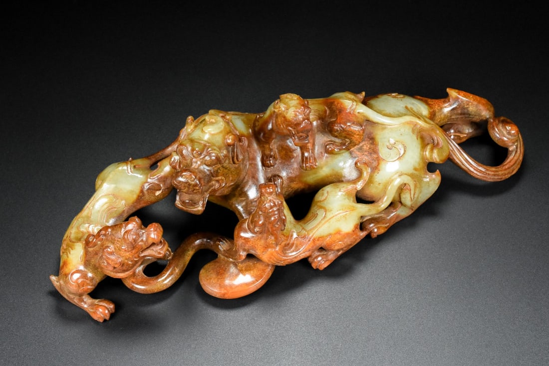 A Rare White Jade Auspicious Beast Ornament: A Rare White Jade Auspicious Beast Ornament,Qing Dynasty,China,Size:12.4inx4.6inx3.9in,Weight:1842g白玉瑞兽摆件,中国清代,Size:31.5cmx11.6cmx