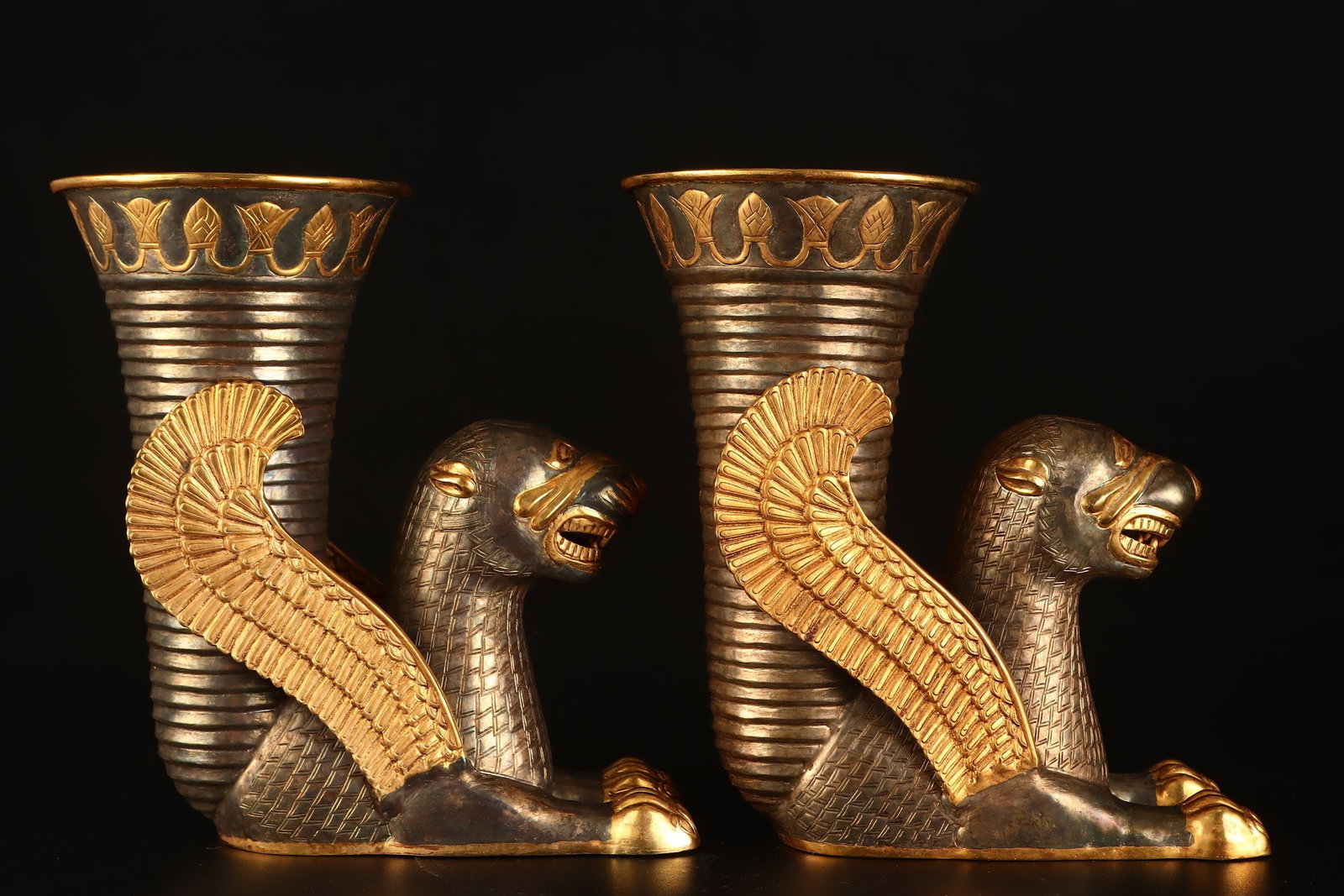 A Pair of Exquisite Gilt Bronze Lion-Shaped Cups: A Pair of Exquisite Gilt Bronze Lion-Shaped Cups,Qing Dynasty,China,Size:7.1inx5.9in,Total Weight:1780g一对铜鎏金狮形杯，中国清&