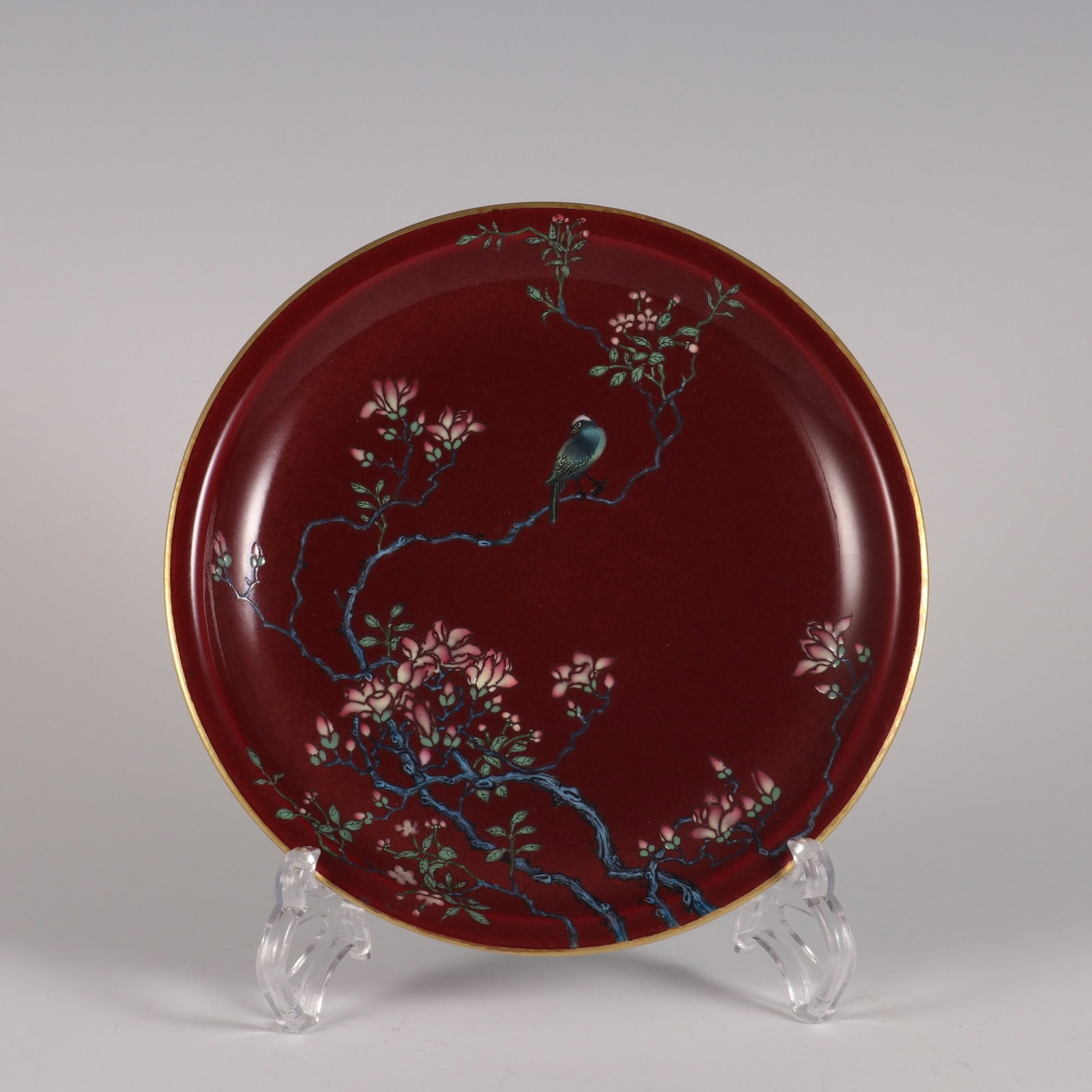 An Exquisite Ji red glaze famille rose flower and bird pattern flared rim plate,: An Exquisite Ji red glaze famille rose flower and bird pattern flared rim plate,Qing Dynasty, China,With