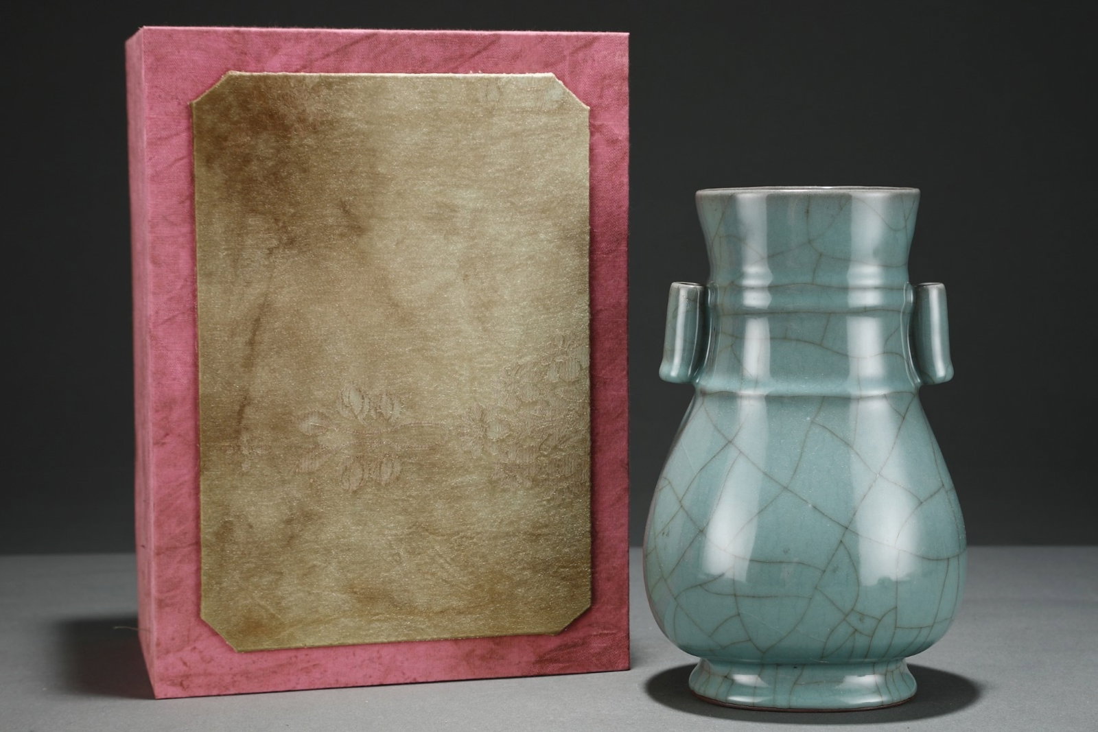 An Exquisite Guan Kiln Pink Celadon Glazed Pierced Ear Vase With String Patterns,Inscribed With: An Exquisite Guan Kiln Pink Celadon Glazed Pierced Ear Vase With String Patterns,Inscribed With Emperor Qianlong's Imperial Poem,China Song Dynasty,Size:9.1inx5.6in,官窑粉青