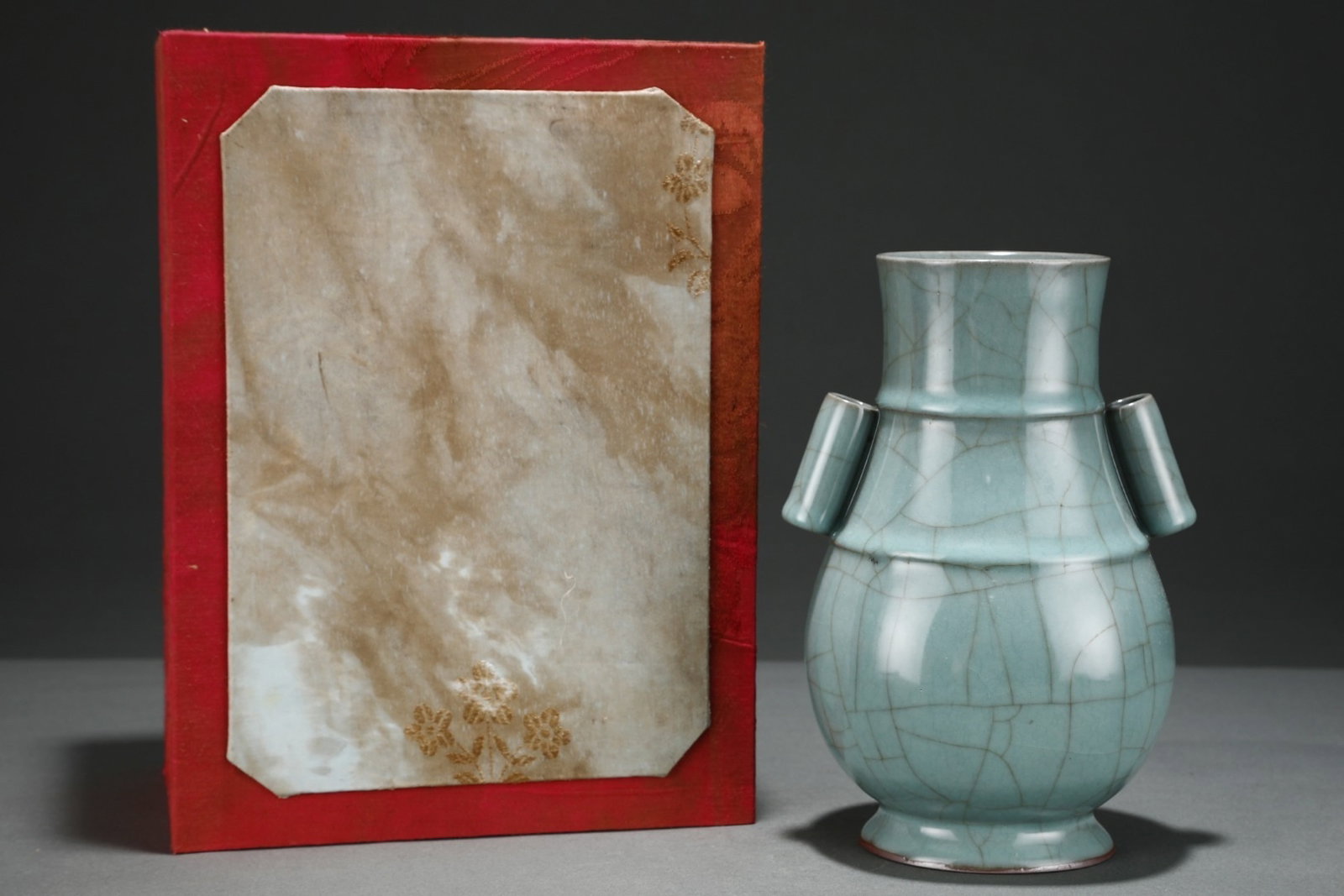 An Exquisite Guan Kiln Pink Celadon Glazed Pierced Ear Vase With String Patterns,Inscribed With: An Exquisite Guan Kiln Pink Celadon Glazed Pierced Ear Vase With String Patterns,Inscribed With Emperor Qianlong's Imperial Poem,China Song Dynasty,Size:8.8inx6.1in,官窑粉青