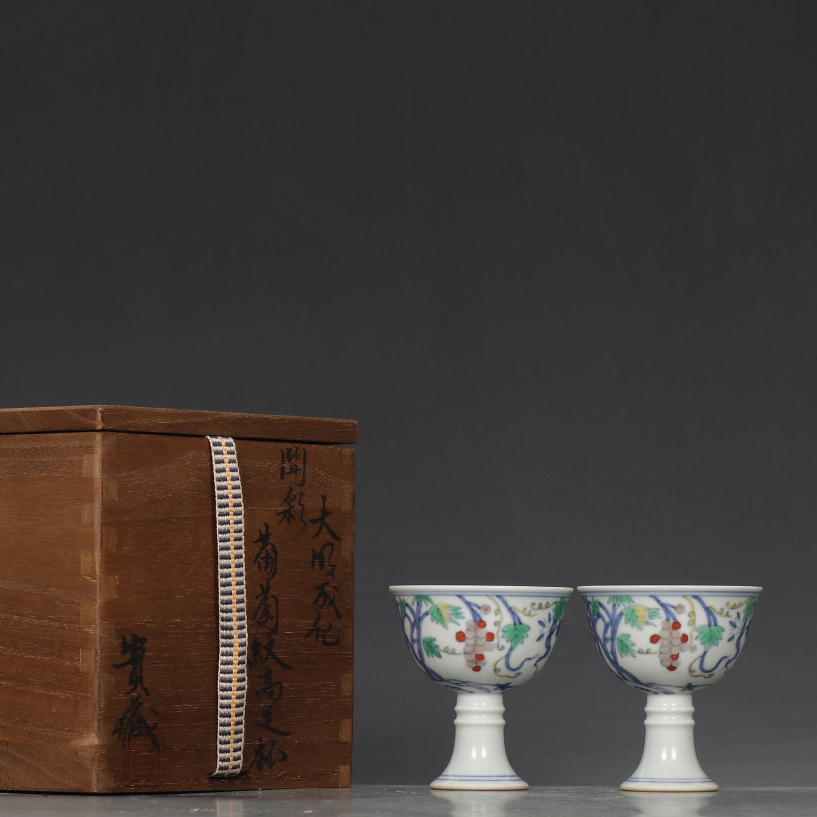 A Pair Of Exquisite Doucai Stem Cups With Grape Patterns (1 of 9)