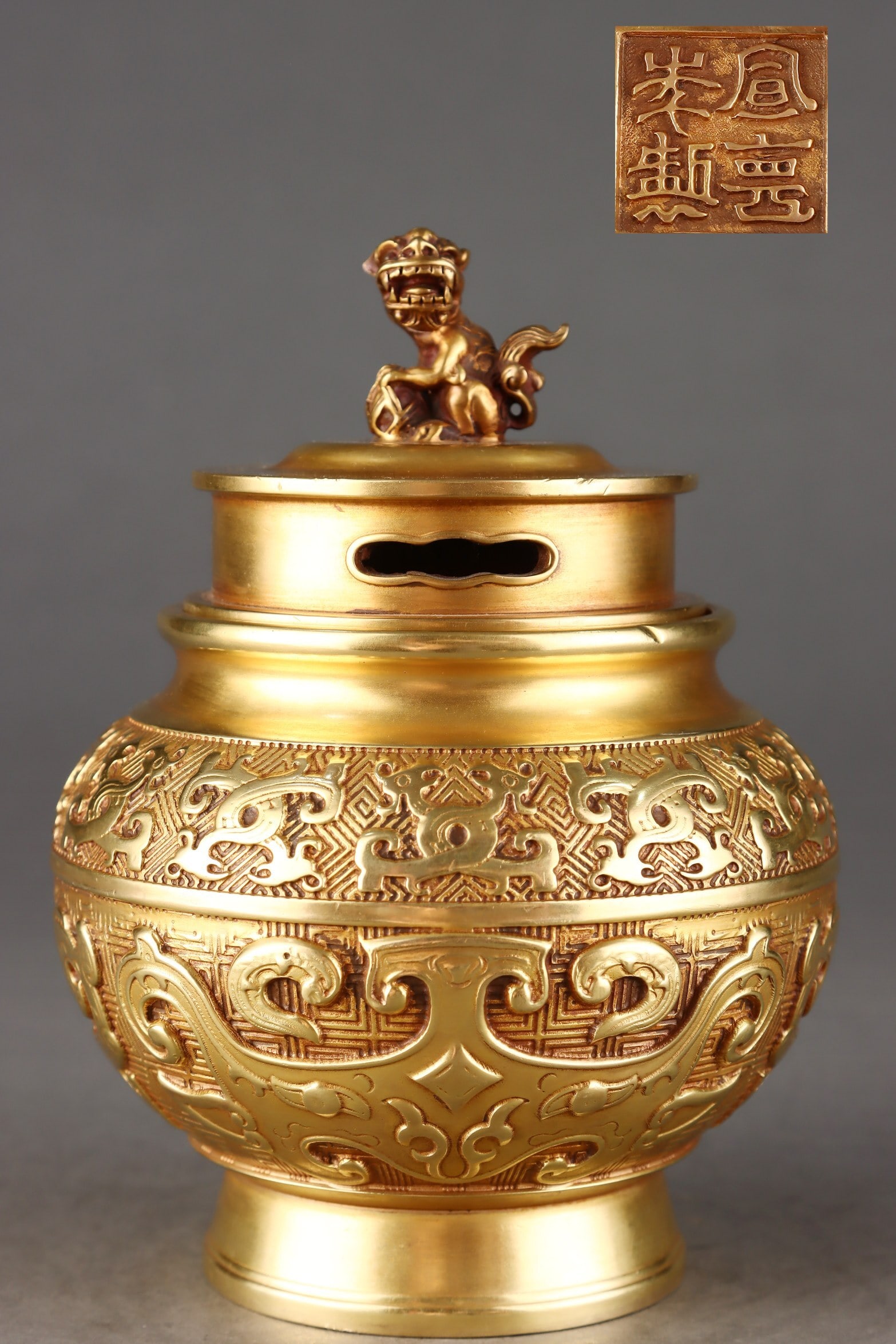 An Exquisite Gilt Bronze Taotie Mask Li-form Incense Burner (1 of 9)
