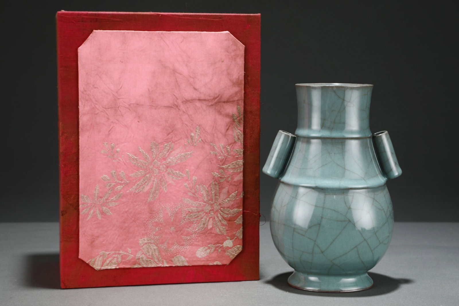 An Exquisite Guan Kiln Pink Celadon Glazed Pierced Ear Vase With String Patterns,Inscribed With: An Exquisite Guan Kiln Pink Celadon Glazed Pierced Ear Vase With String Patterns,Inscribed With Emperor Qianlong's Imperial Poem,China Song Dynasty,Size:8.9inx6.2in,官窑粉青