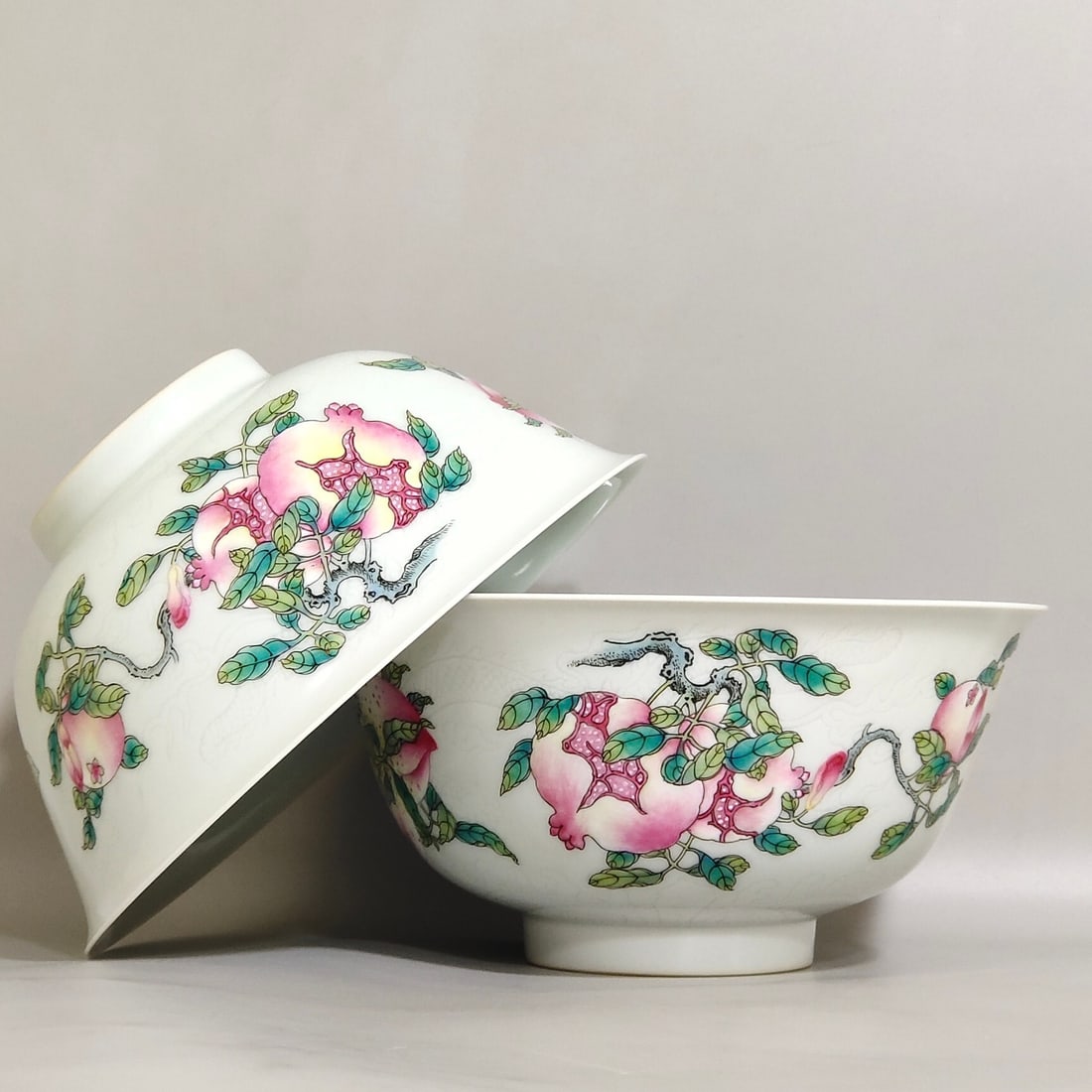 A Pair Of Exquisite White Glaze Bowls With Hidden Carved Cloud Dragon Patterns And Famille Rose: A Pair Of Exquisite White Glaze Bowls With Hidden Carved Cloud Dragon Patterns And Famille Rose Three-Many Motifs On Exterior,Qing Dynasty,China,Yongzheng Six-character Mark,一对白&#