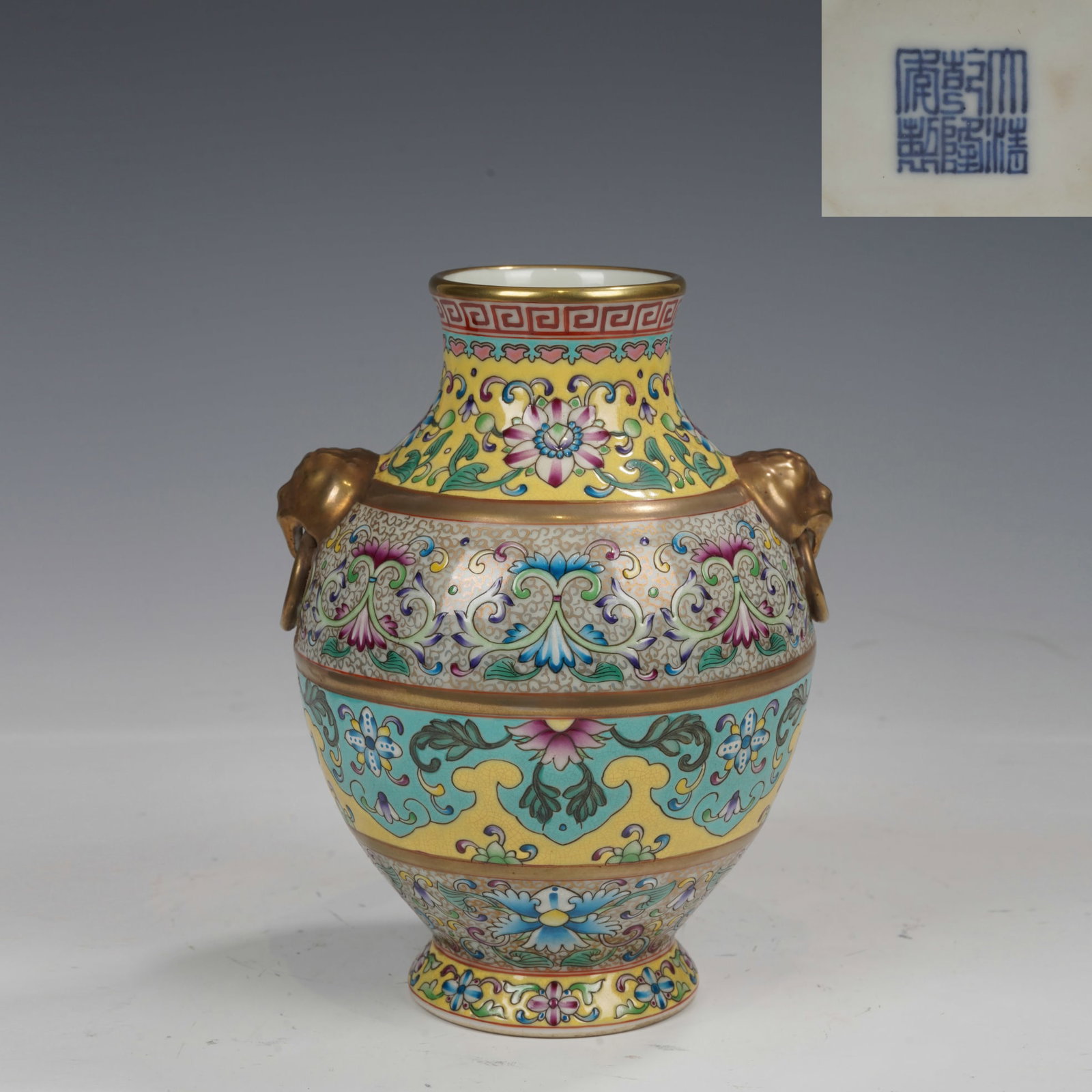 An Exquisite Famille Rose Vase With Elephant Ears And Ring Handles,Decorated With Interlocking: An Exquisite Famille Rose Vase With Elephant Ears And Ring Handles,Decorated With Interlocking Floral Pattern,Qing Dynasty,China,Six-Character Qianlong Mark,Dimensions:5.9inx5.5inx7.9in,粉ঊ