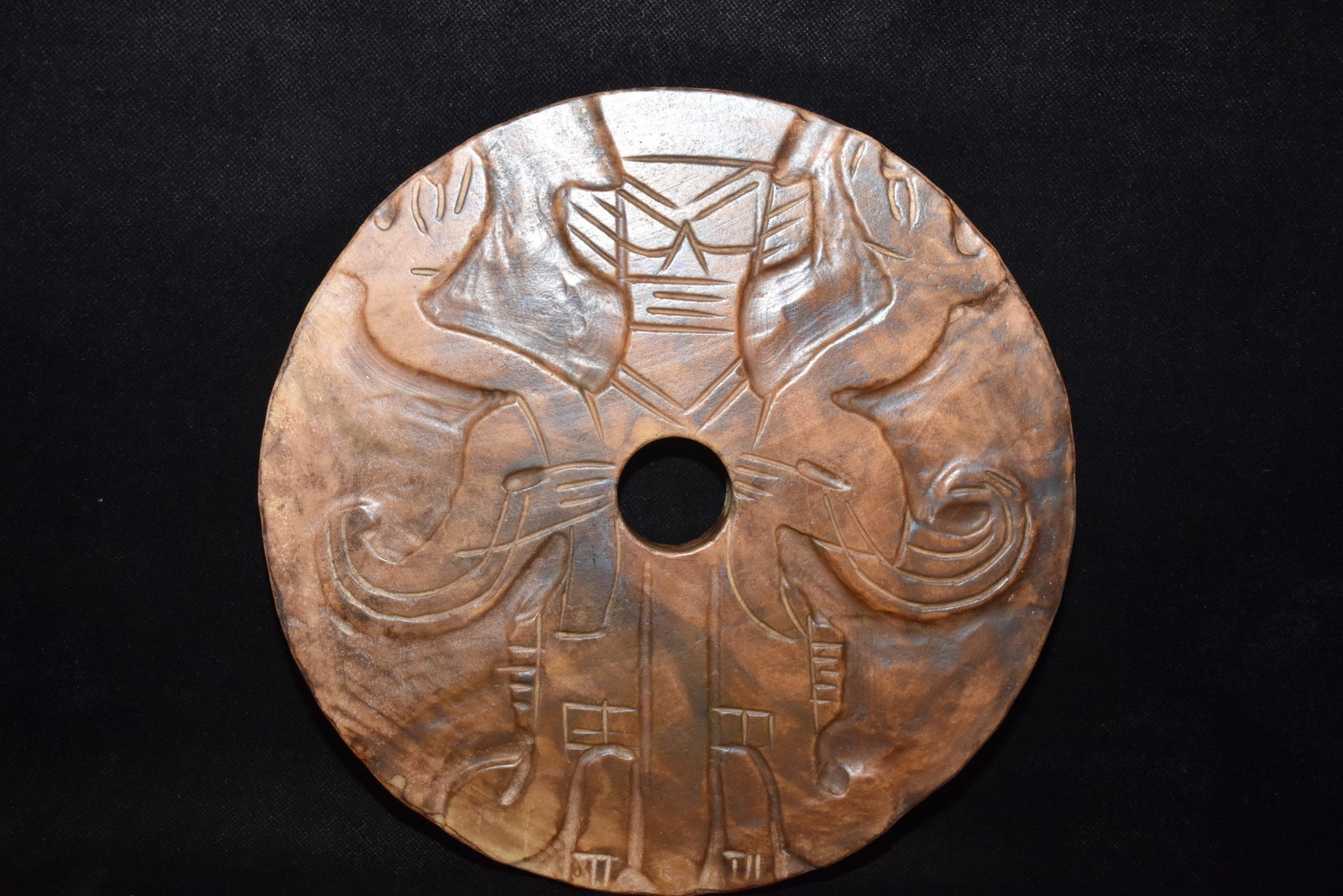 A Fine White Jade Disc Bi Carved With Deity Pattern: A Fine White Jade Disc Bi Carved With Deity Pattern,Hongshan Culture,Dimensions:9.8in,Weight:2190g,白玉神人纹玉璧,红山文化