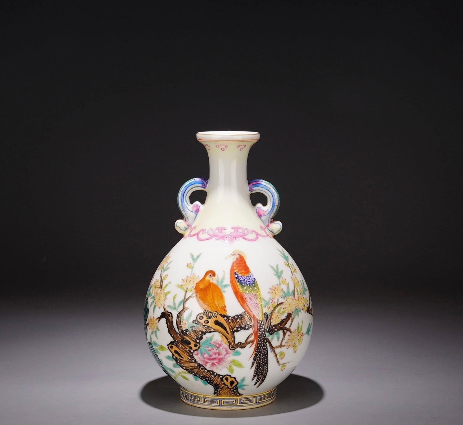 An Exquisite Enamel Double-Eared Vase With Flower And Bird Patterns: An Exquisite Enamel Double-Eared Vase With Flower And Bird Patterns,Qing Dynasty China,Four-Character Qianlong Mark,Dimensions:11.8inx6.7in,珐琅彩花鸟双耳
