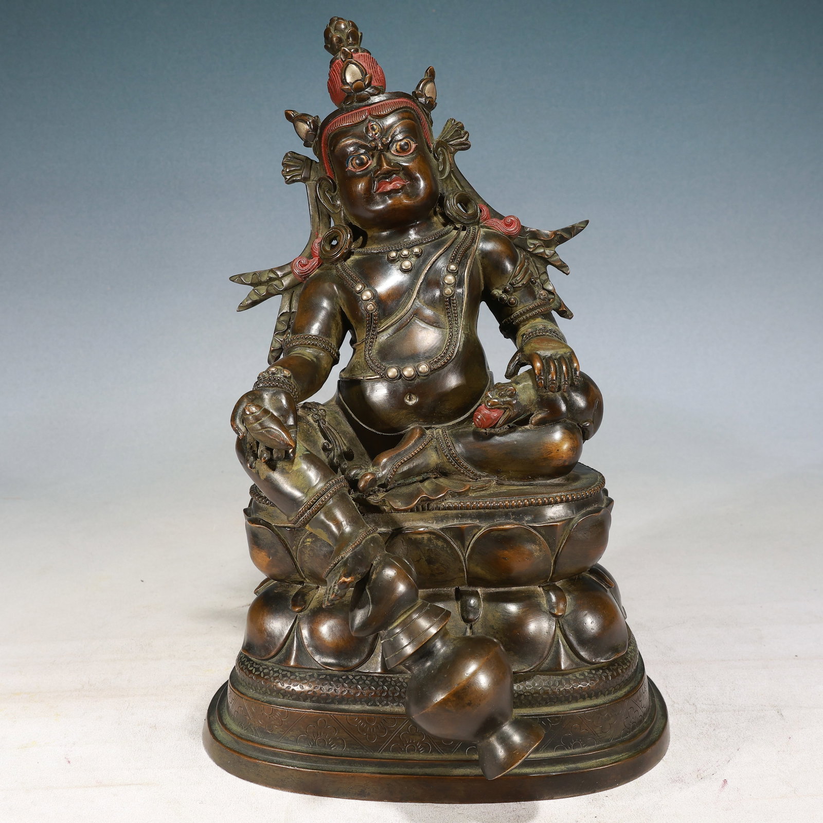 A Solemn Bronze Inlaid Silver Statue of Mammon: A Solemn Bronze Inlaid Silver Statue of Mammon,Qing Dynasty, China,Size:9.8inx8.7inx15.4in,Weight:11000g 铜嵌银财神像,中国清代