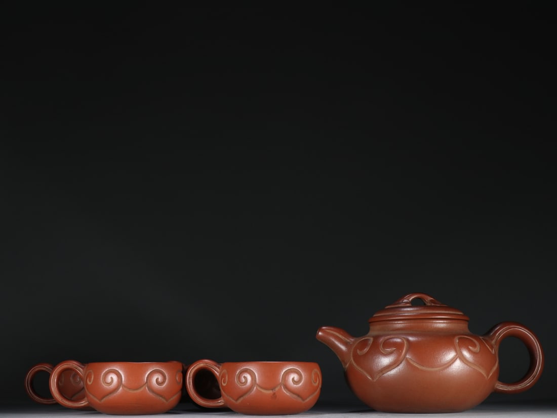 A Fine Set of Chinese Zisha Clay Teapots with Ruyi Decoration (1 of 9)