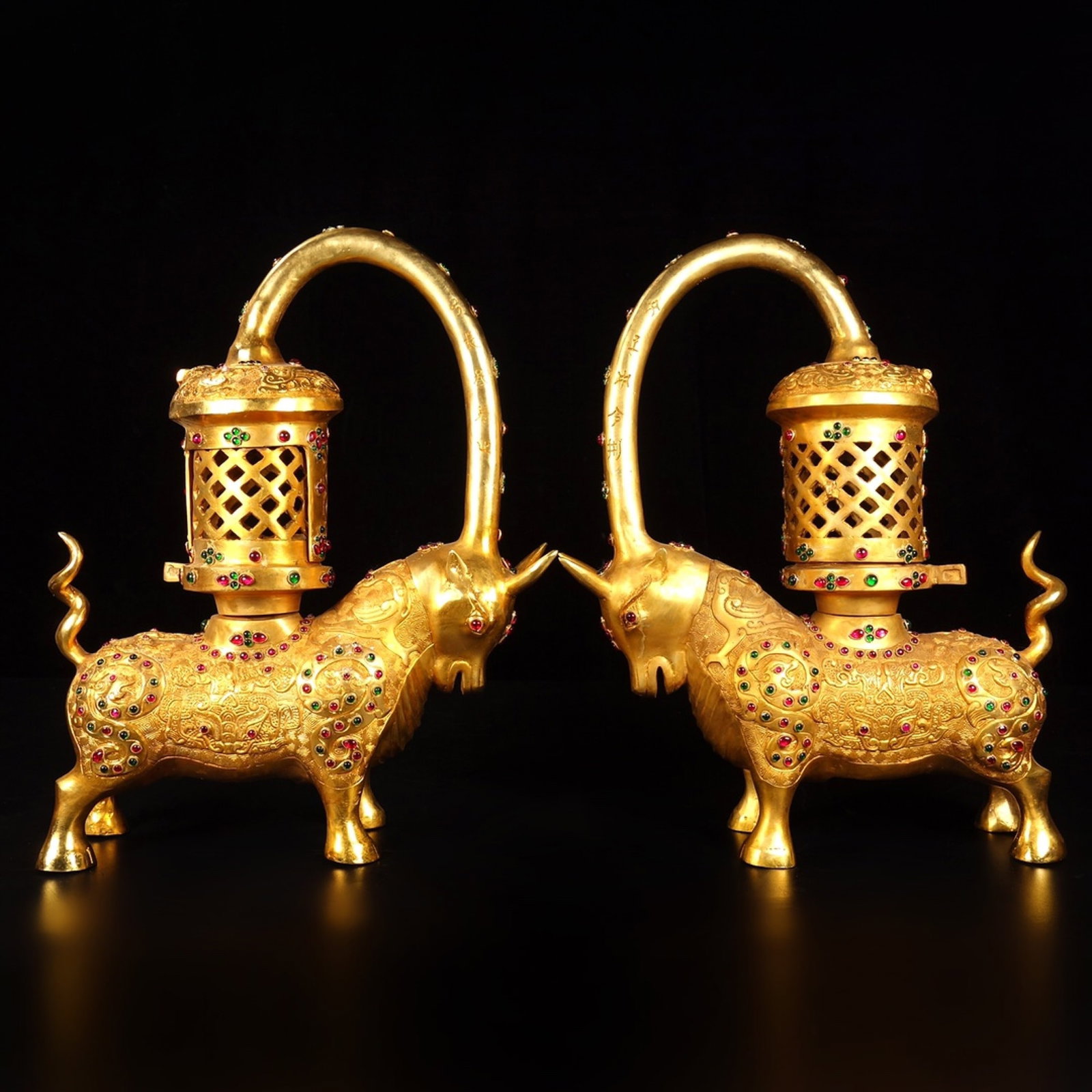 A Pair Of Exquisite Gilt Bronze Palace Lantern Ornaments With Auspicious Oxen Inlaid With Gemstones: A Pair Of Exquisite Gilt Bronze Palace Lantern Ornaments With Auspicious Oxen Inlaid With Gemstones,China,Qing Dynasty,Dimensions:14.2inx11.4in,Weight:5535g,一对铜鎏金