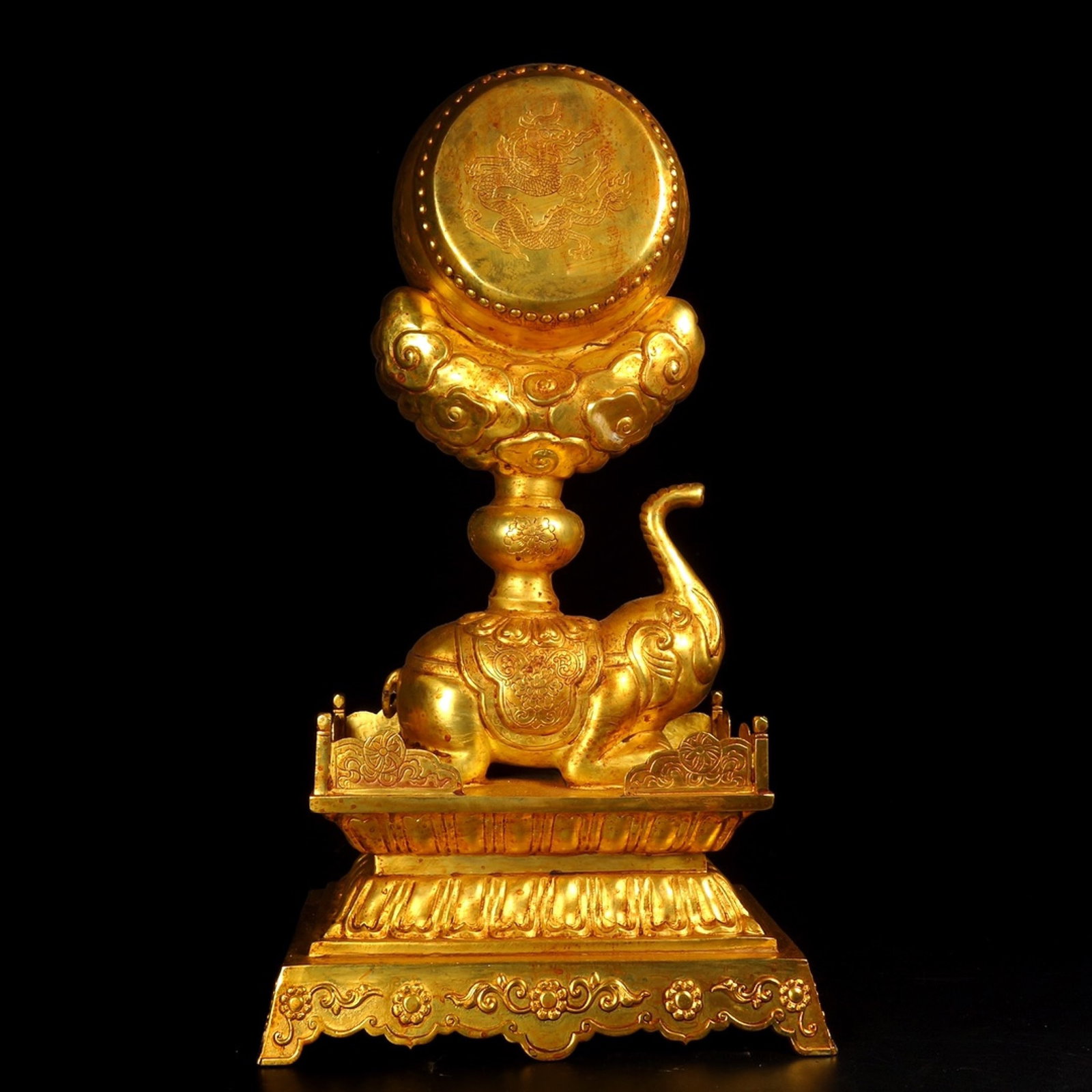 An Exquisite Gilt Bronze Ornament Of Recumbent Elephant Carrying A Drum: An Exquisite Gilt Bronze Ornament Of Recumbent Elephant Carrying A Drum,China,Tang Dynasty,Dimensions:15.7inx8.3in,Weight:3661g,铜鎏金卧象驮鼓摆件