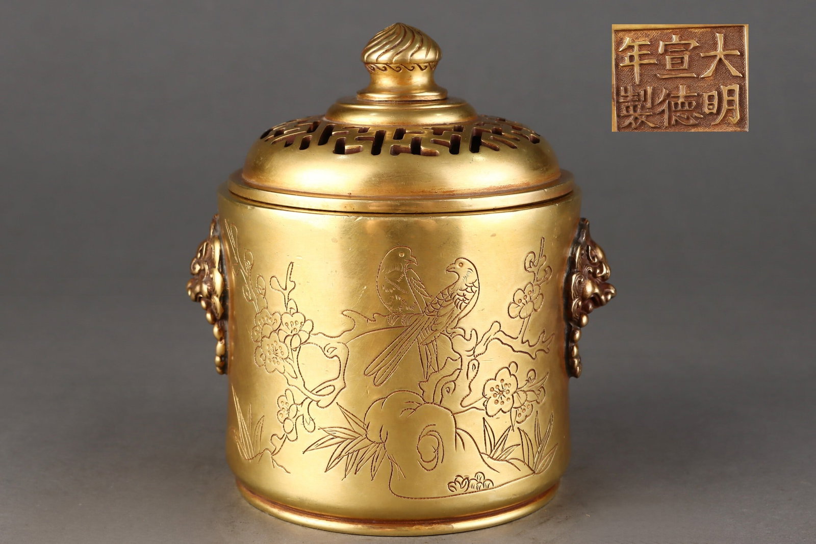 An Exquisite Gilt Bronze Cylindrical Censer with Mask and Ring Handles and Magpie on Plum Blossom: An Exquisite Gilt Bronze Cylindrical Censer with Mask and Ring Handles and Magpie on Plum Blossom Decoration,Chinese,Ming Dynasty,Six-character Xuande mark,Size:6.5inx4.9in,Weight:3150g,铜ແ