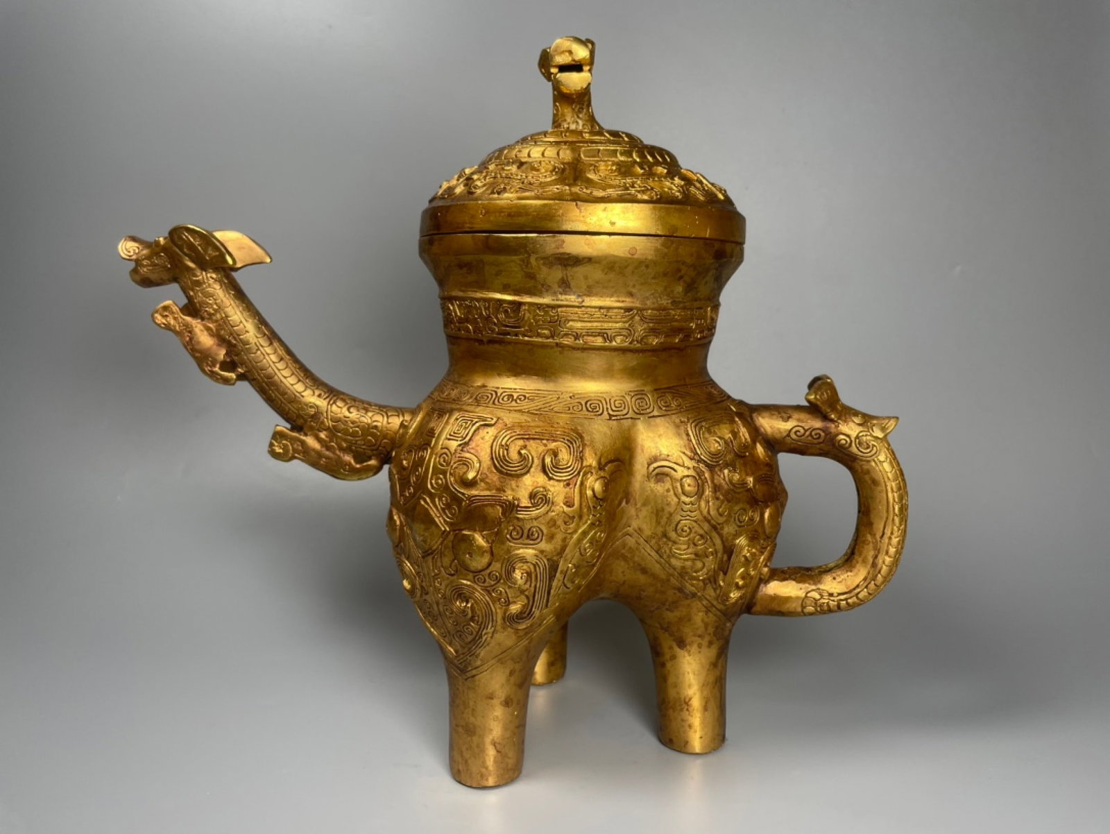 An Exquisite Gilt Bronze Tripod He Vessel With Beast Spout And Handle (1 of 7)