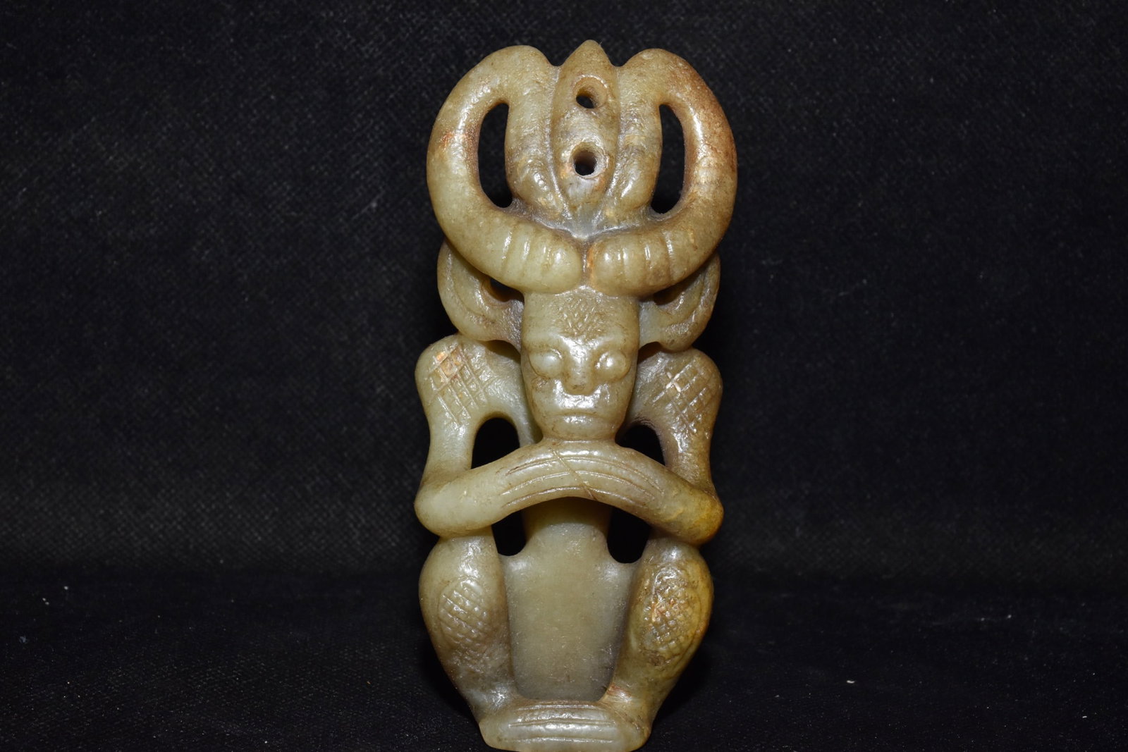 A Fine White Jade Sun God Ornament: A Fine White Jade Sun God Ornament,Hongshan Culture,Dimensions:2inx 4.3in,Weight:180g,白玉太阳神摆件,红山文化