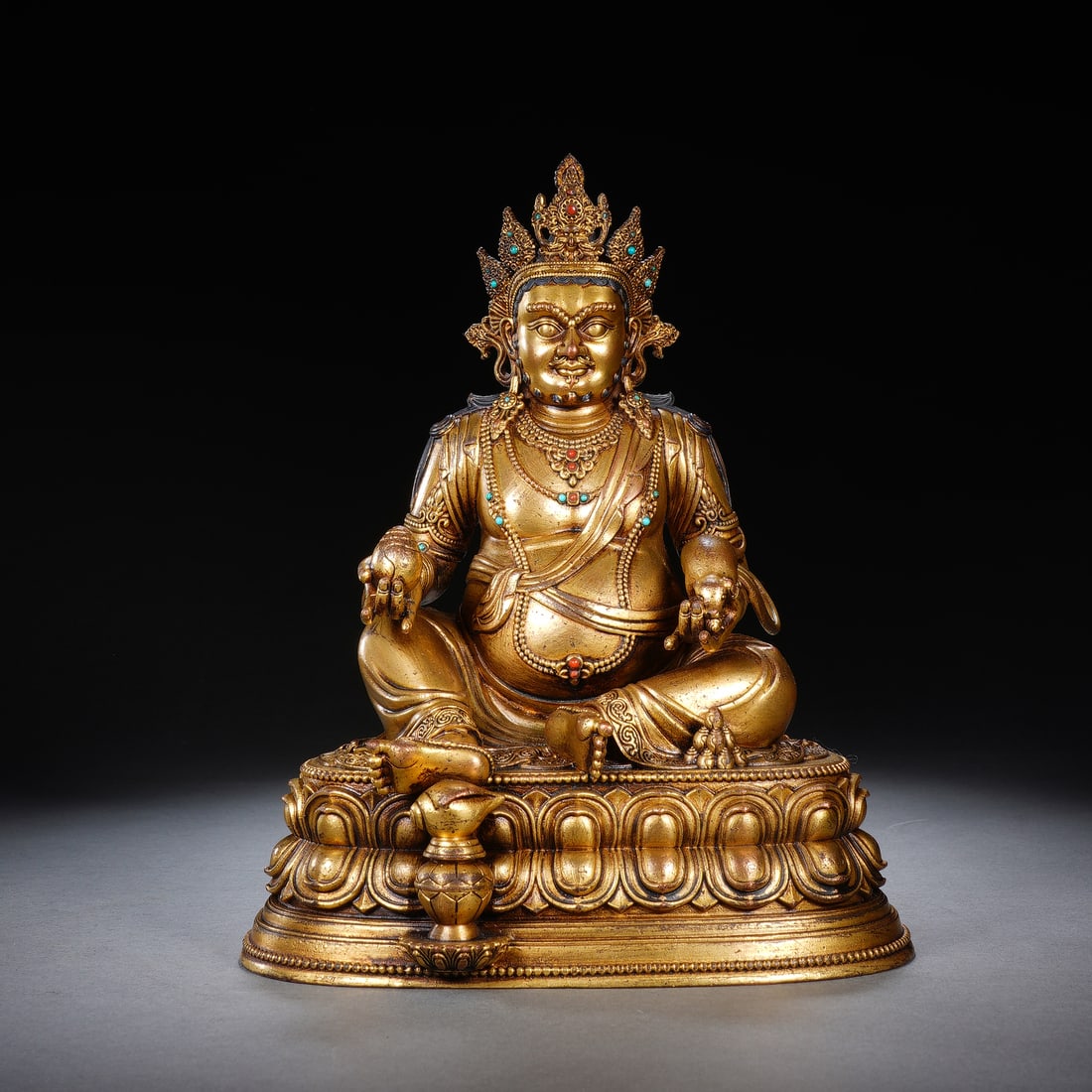 An Exquisite Gilt Copper Seated Statue Of Yellow Jambhala: An Exquisite Gilt Copper Seated Statue Of Yellow Jambhala,Qing Dynasty,China,Dimensions:6.4inx4.7inx7.9in,Weight:1874g,铜鎏金黄财神坐像,中国