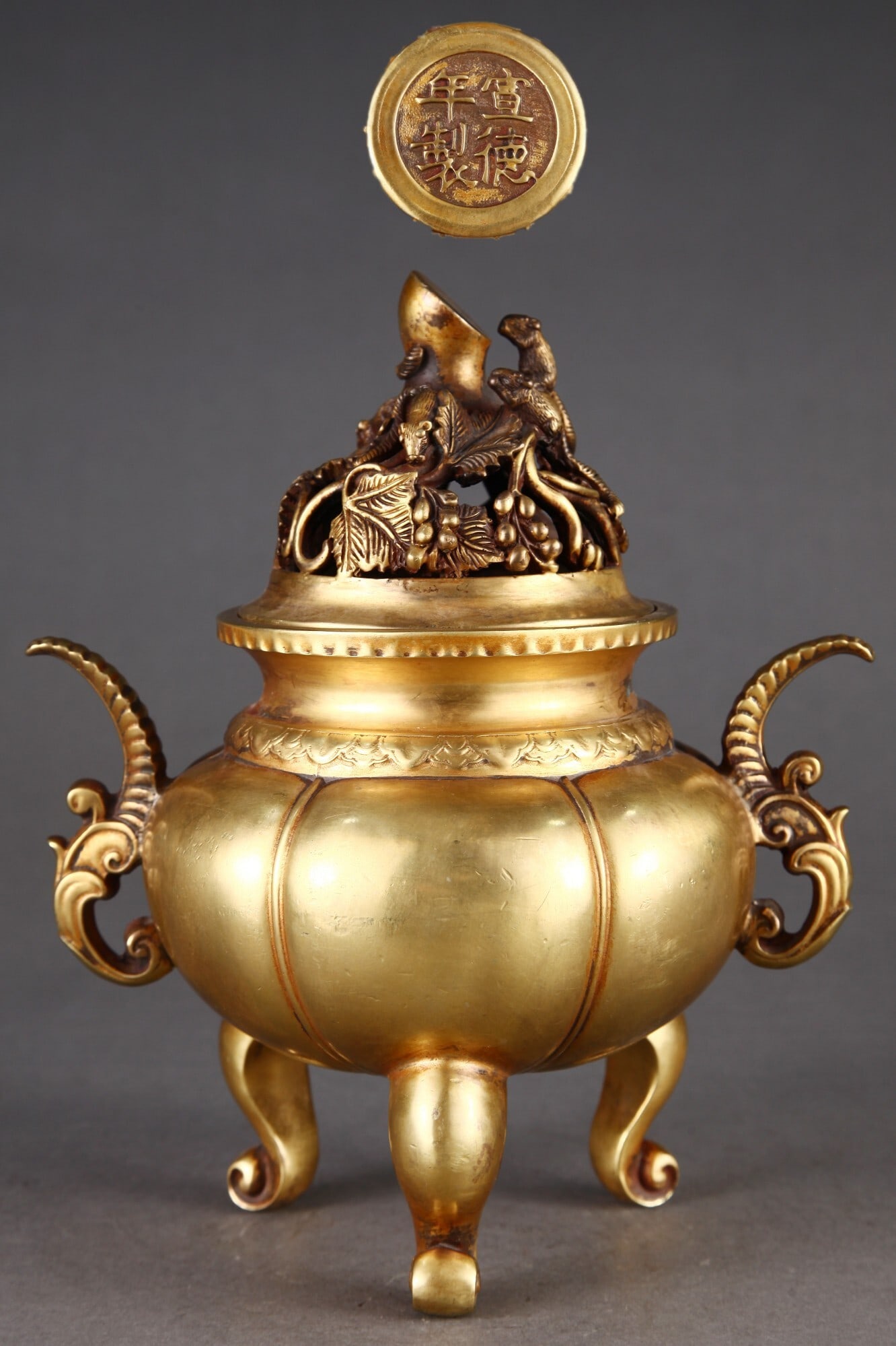 An Exquisite Gilt Bronze Melon-ribbed Incense Burner with Phoenix Head Handles (1 of 9)