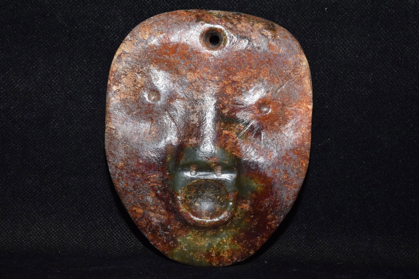 A Fine White Jade Human?Face Hanging Ornament: A Fine White Jade Human‑Face Hanging Ornament,Hongshan Culture,Dimensions:3.5inx 4.5in,Weight:360g,白玉人面挂饰,红山文化
