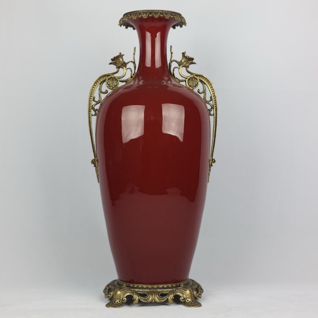 An Exquisite Langyao Red Glaze Long-Neck Decorative Vase With Double Ears And Copper Lace Trim: An Exquisite Langyao Red Glaze Long-Neck Decorative Vase With Double Ears And Copper Lace Trim,China Qing Dynasty,Six-Character Qianlong Mark,Dimensions:19.7inx9.1in,郎红釉镶&#