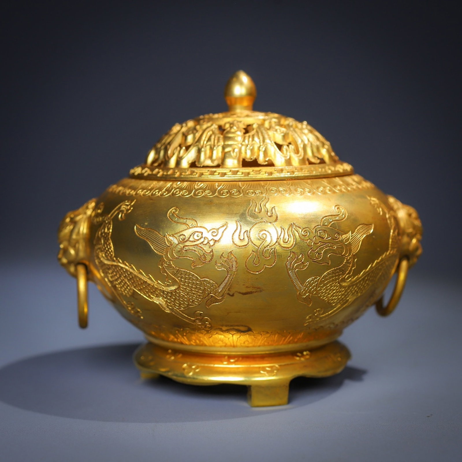 An Exquisite Gilt Bronze Incense Burner With Chiseled Double Dragon Patterns,Beast Ears And Movable: An Exquisite Gilt Bronze Incense Burner With Chiseled Double Dragon Patterns,Beast Ears And Movable Rings,China,Qing Dynasty,Four Character Qianlong Mark,Dimensions:3.9inx5.1in,Weight:737g,铜