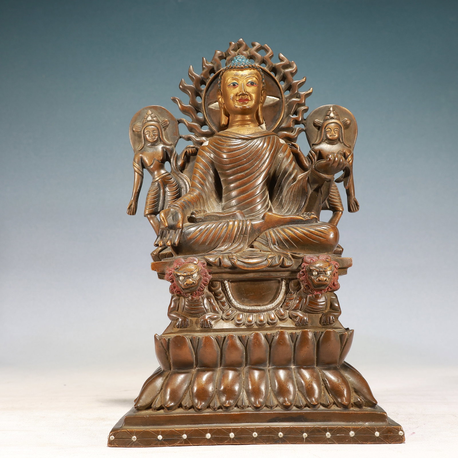 A Solemn Gilt Bronze Inlaid Silver Statue of Sakyamuni,With Inscription: A Solemn Gilt Bronze Inlaid Silver Statue of Sakyamuni,With Inscription,Qing Dynasty, China,Qianlong Mark,Size:8.3inx5.5inx13.8in,Weight:8700g 铜鎏金嵌银释迦&