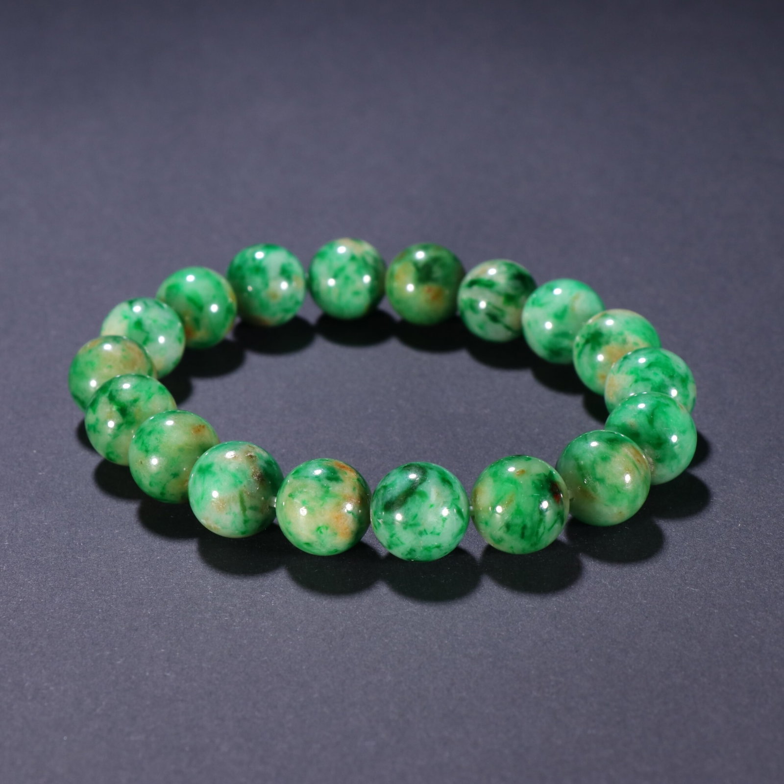 An Exquisite Jadeite Round Bead Bracelet: An Exquisite Jadeite Round Bead Bracelet,China Qing Dynasty,Dimension:0.4in,Weight:46g,翡翠圆珠手串,中国清代