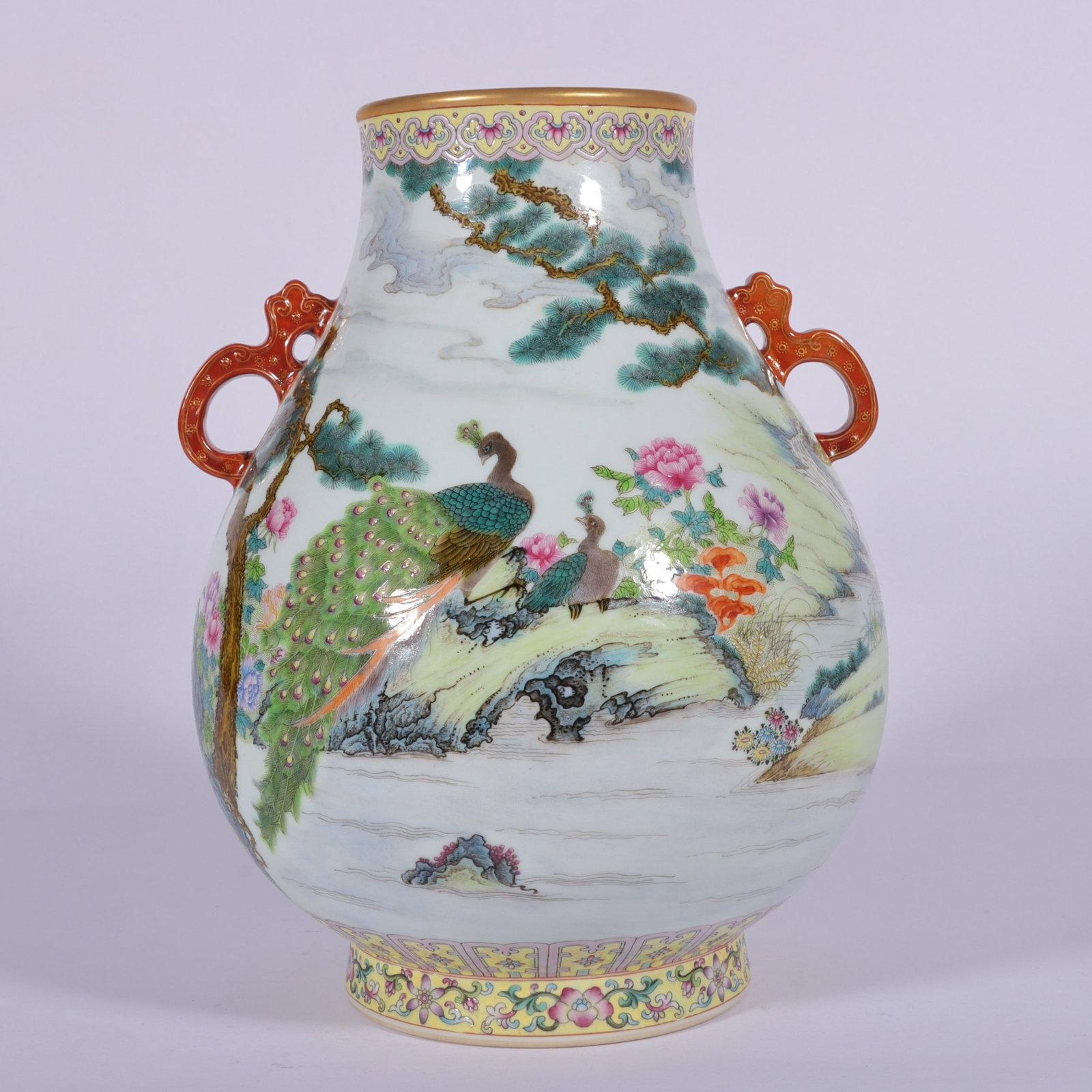 A Fine Enamel Color Double-Eared Zun with Continuous Peacock Scene: A Fine Enamel Color Double-Eared Zun with Continuous Peacock Scene,Qing Dynasty,China,Qianlong Six-character Mark,Size:10inx7.5in,珐琅彩通景孔雀双೑