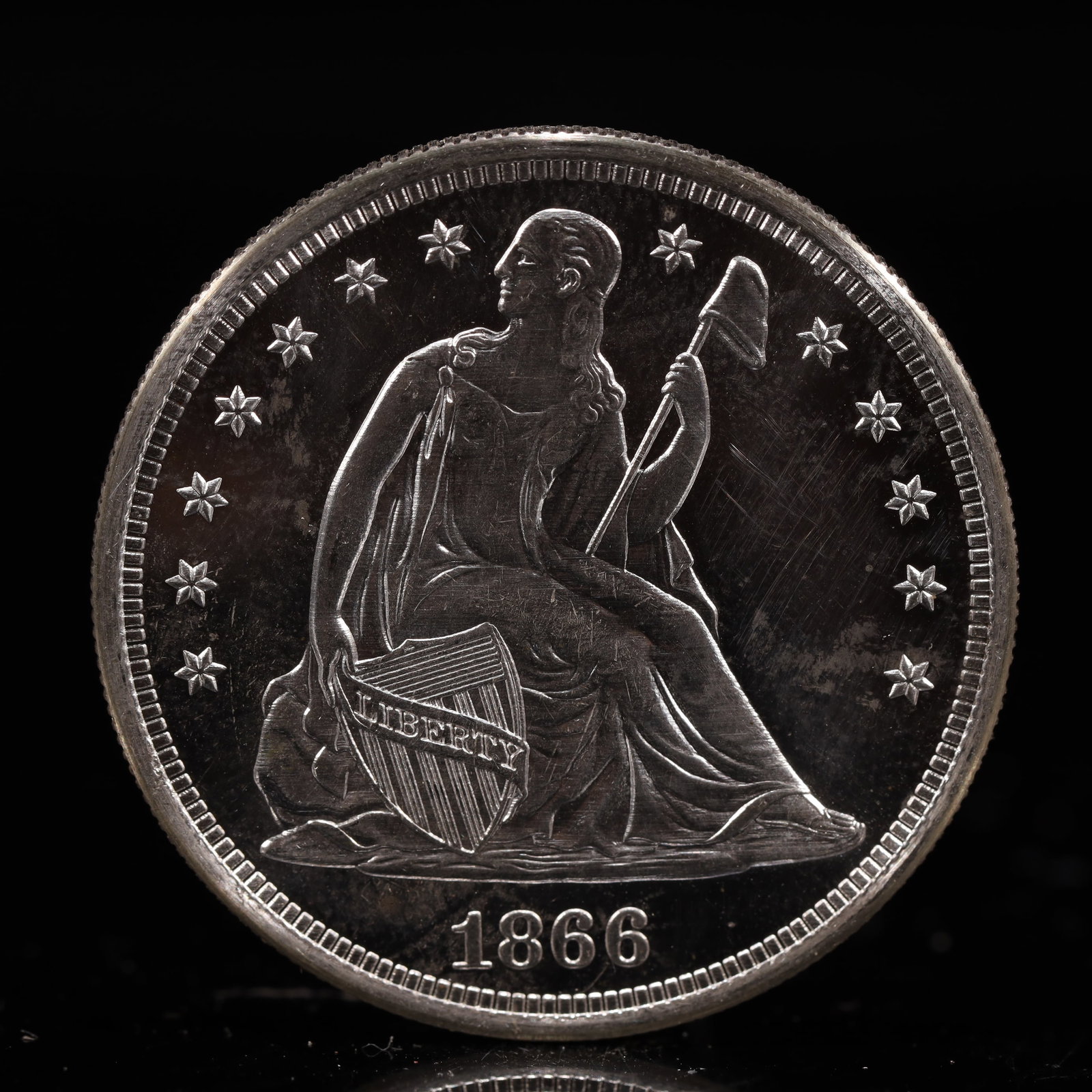 USA One Dollar 1866 Coin: American coin. IN GOD WE TRUST / LIBERTY / 1866 / UNITED STATES OF AMERICA / ONE DOL. Weight:26.9g.