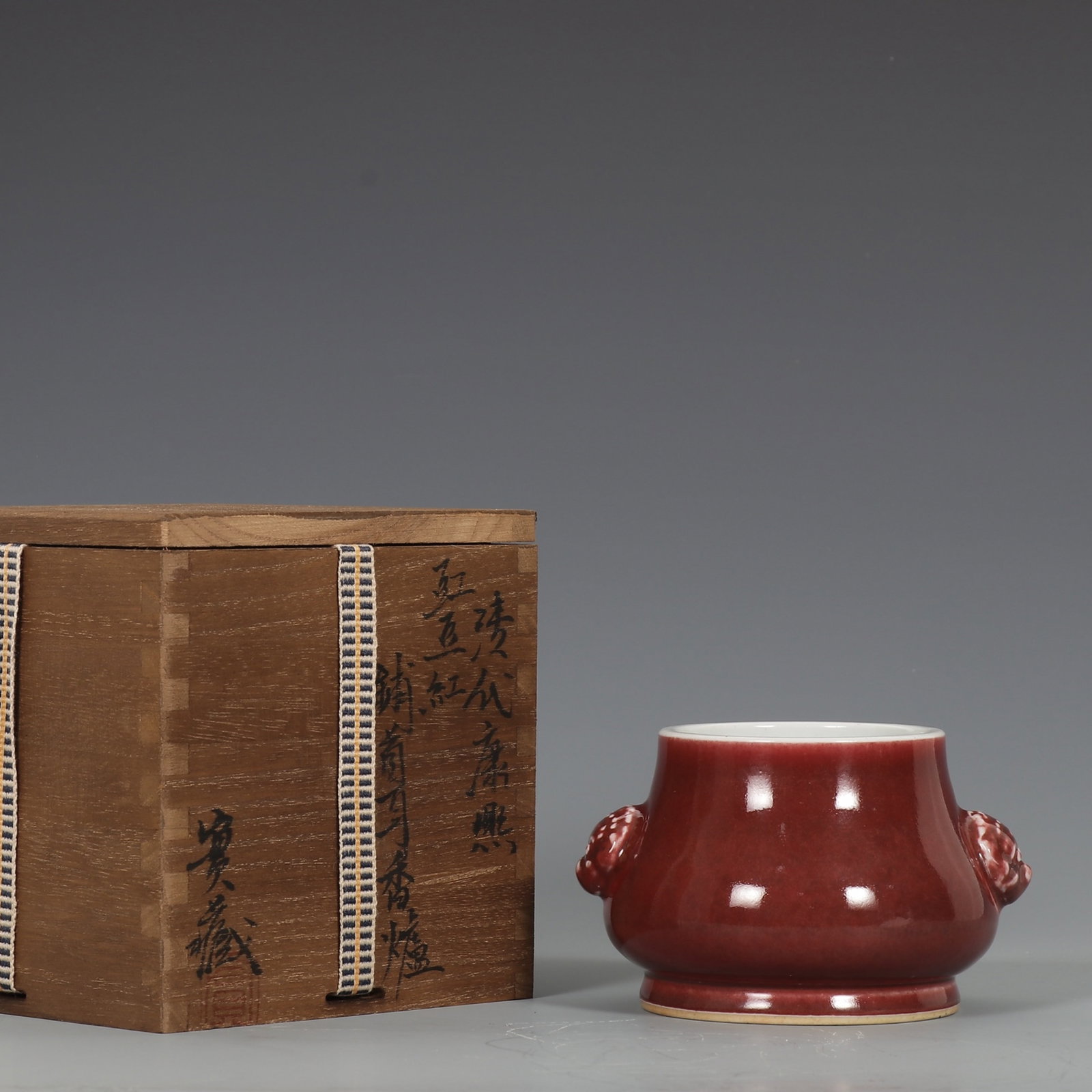 An Exquisite Cowpea Red Glaze Censer With Beast Mask Handles: An Exquisite Cowpea Red Glaze Censer With Beast Mask Handles,Qing Dynasty,China,Kangxi Six-character Mark,Size:3inx4.9in,豇豆红辅首耳香炉,中ࢲ