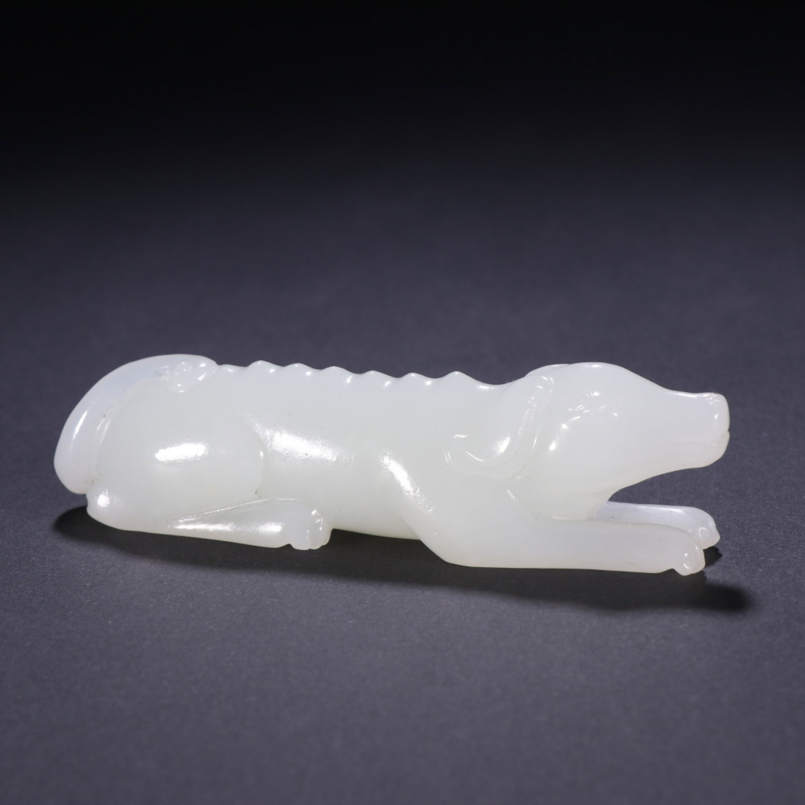 An Exquisite White Jade Dog Hand Piece: An Exquisite White Jade Dog Hand Piece,China Qing Dynasty,Dimensions:1inx3.4in,Weight:66.3g,白玉犬把件,中国清代
