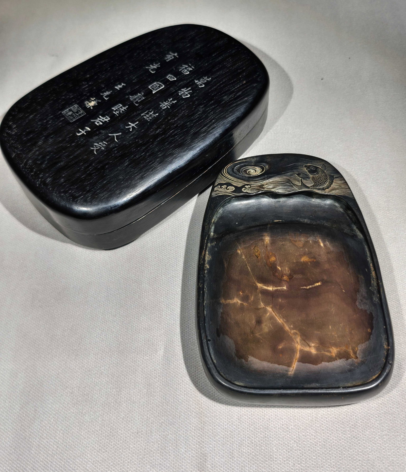 A Fine Duanshi Free?Form Inkstone With Leaping?Fish Pattern: A Fine Duanshi Free‑Form Inkstone With Leaping‑Fish Pattern,China,Qing Dynasty,Marks Of Wang Xianqian And Zhang Baixi,Dimensions:8.5inx5.9inx2.1in,端石鱼跃纹&