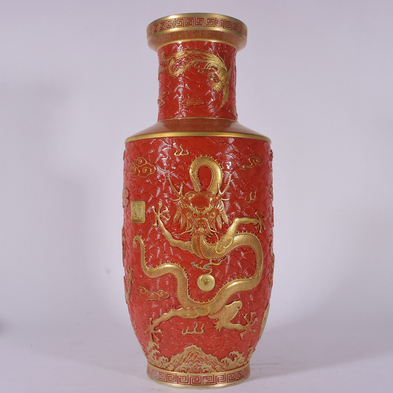 A Fine Carved Iron-Red Gilt Dragon and Phoenix Club Vase: A Fine Carved Iron-Red Gilt Dragon and Phoenix Club Vase,Qing Dynasty,China,Qianlong Six-character Mark,Size:15.7inx6.3in,雕刻矾红描金龙凤纹੻