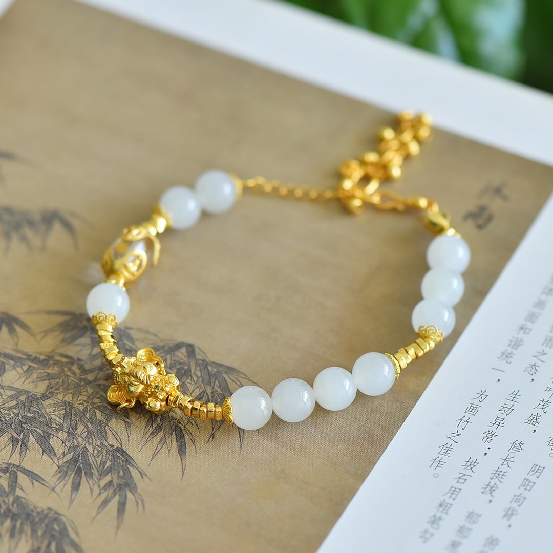 An Exquisite Sterling Silver-Gold Plated White Jade Bracelets: An Exquisite Sterling Silver-Gold Plated White Jade Bracelets 纯银镀金镶白玉手串