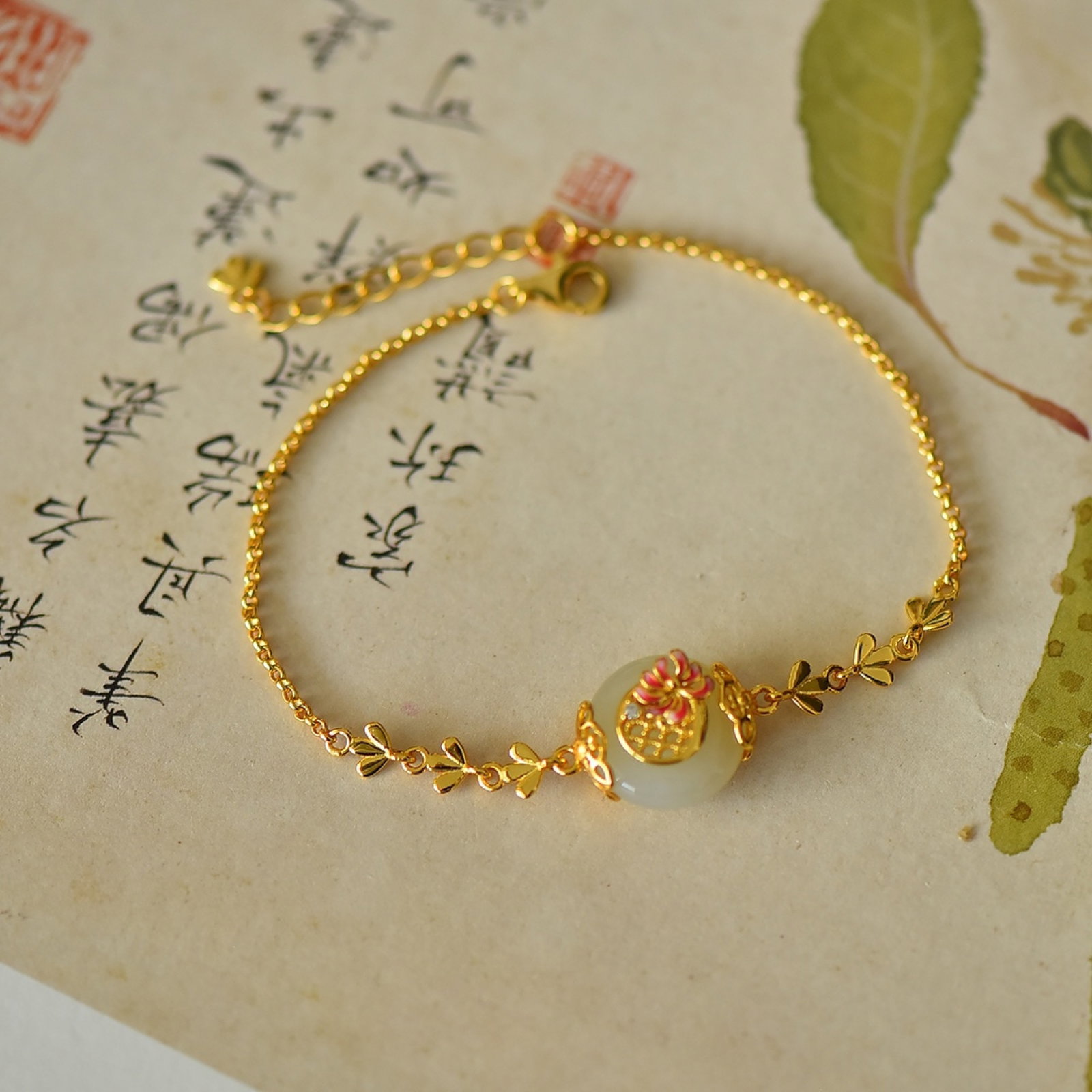 An Exquisite Sterling Silver-Gold Plated Inlaid White Jade Enamel Bracelets: An Exquisite Sterling Silver-Gold Plated Inlaid White Jade Enamel Bracelets,Size:13mmx13mm 纯银镀金镶白玉珐琅手链