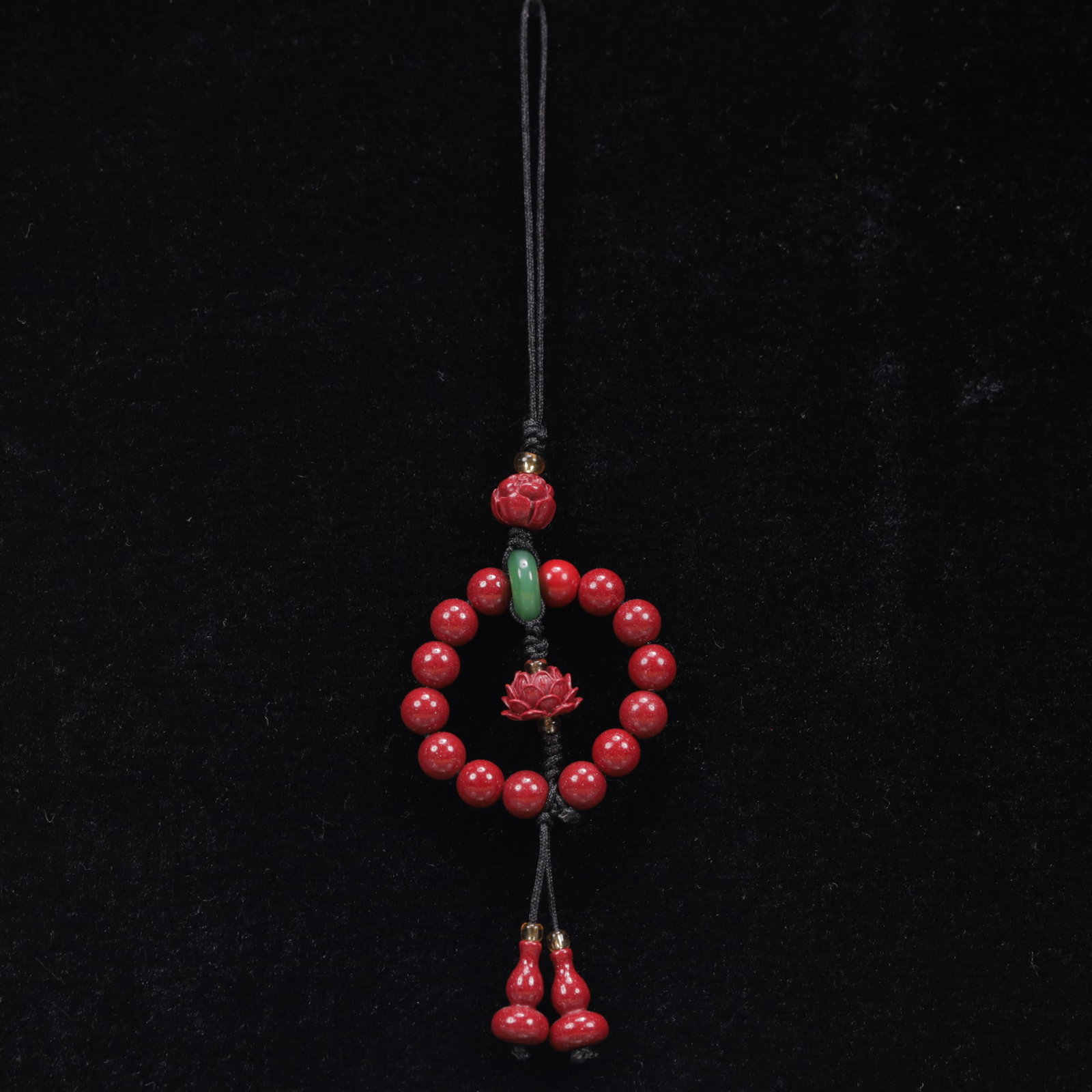 An Exquisite Cinnabar Lotus Pattern Pendant: An Exquisite Cinnabar Lotus Pattern Pendant, Size:3.5cmx4.5cm, Weight:10g 朱砂莲花挂件