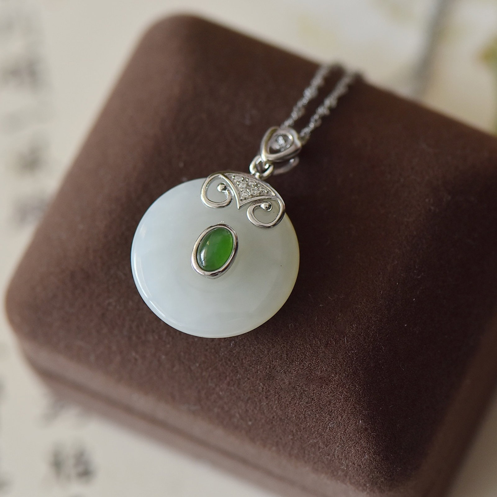 An Exquisite Sterling Silver Inlaid White Jade Pendant: An Exquisite Sterling Silver Inlaid White Jade Pendant,Size:23mmx23mm 纯银镶白玉吊坠
