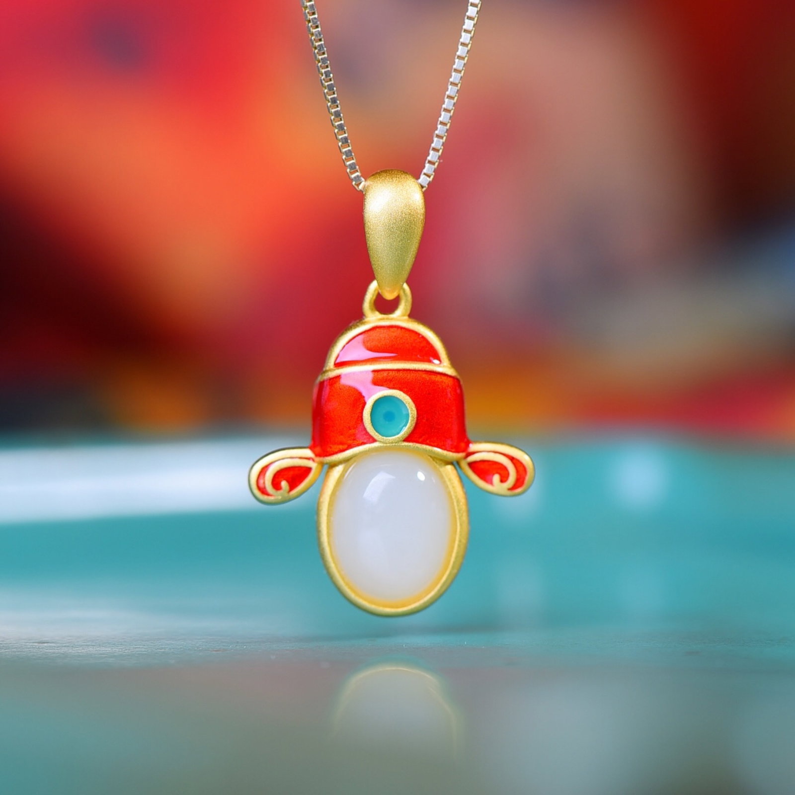 An Exquisite Sterling Silver-Gold Plated Inlaid White Jade Pendant: An Exquisite Sterling Silver-Gold Plated Inlaid White Jade Pendant,Size:7mmx9mm 纯银镀金镶白玉吊坠
