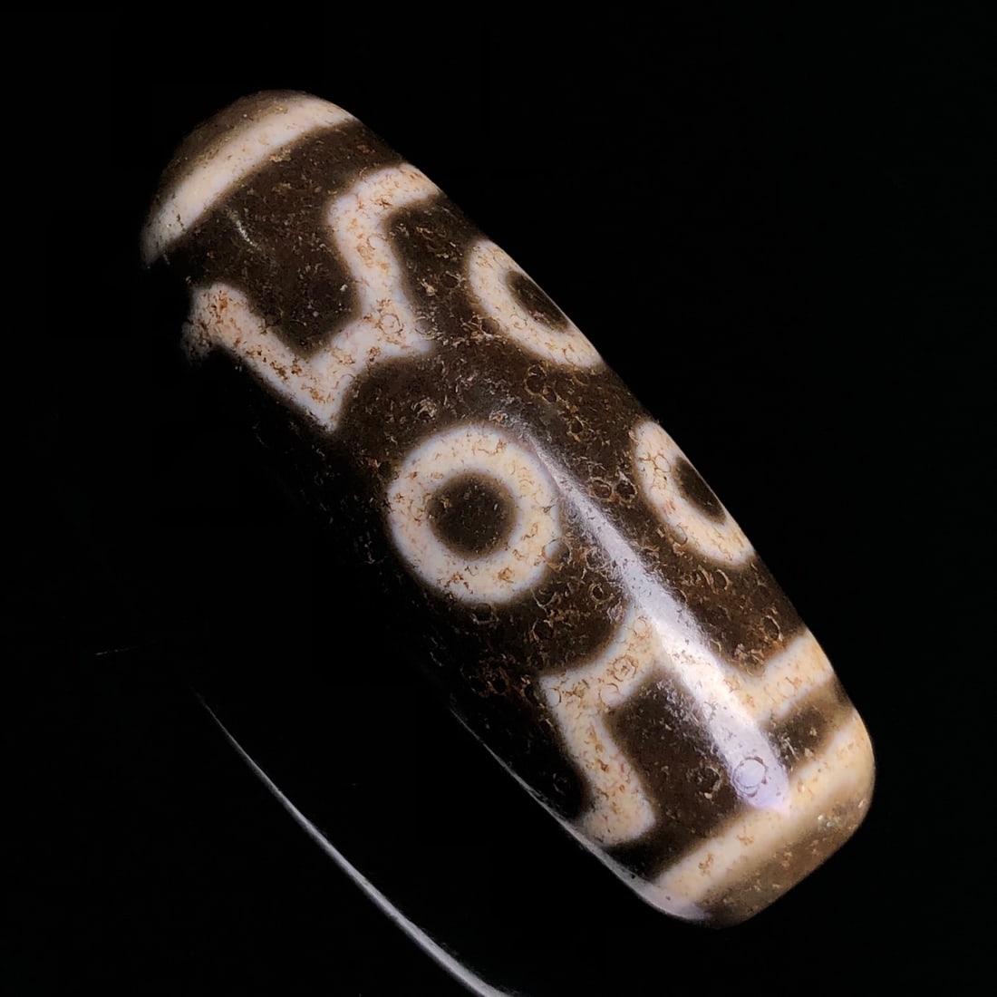 An Exquisite Seven Eyes Dzi Bead Pendant: An Exquisite Seven Eyes Dzi Bead Pendant,Size:45mmx17mm,Weight:19.1g 七眼天珠挂件