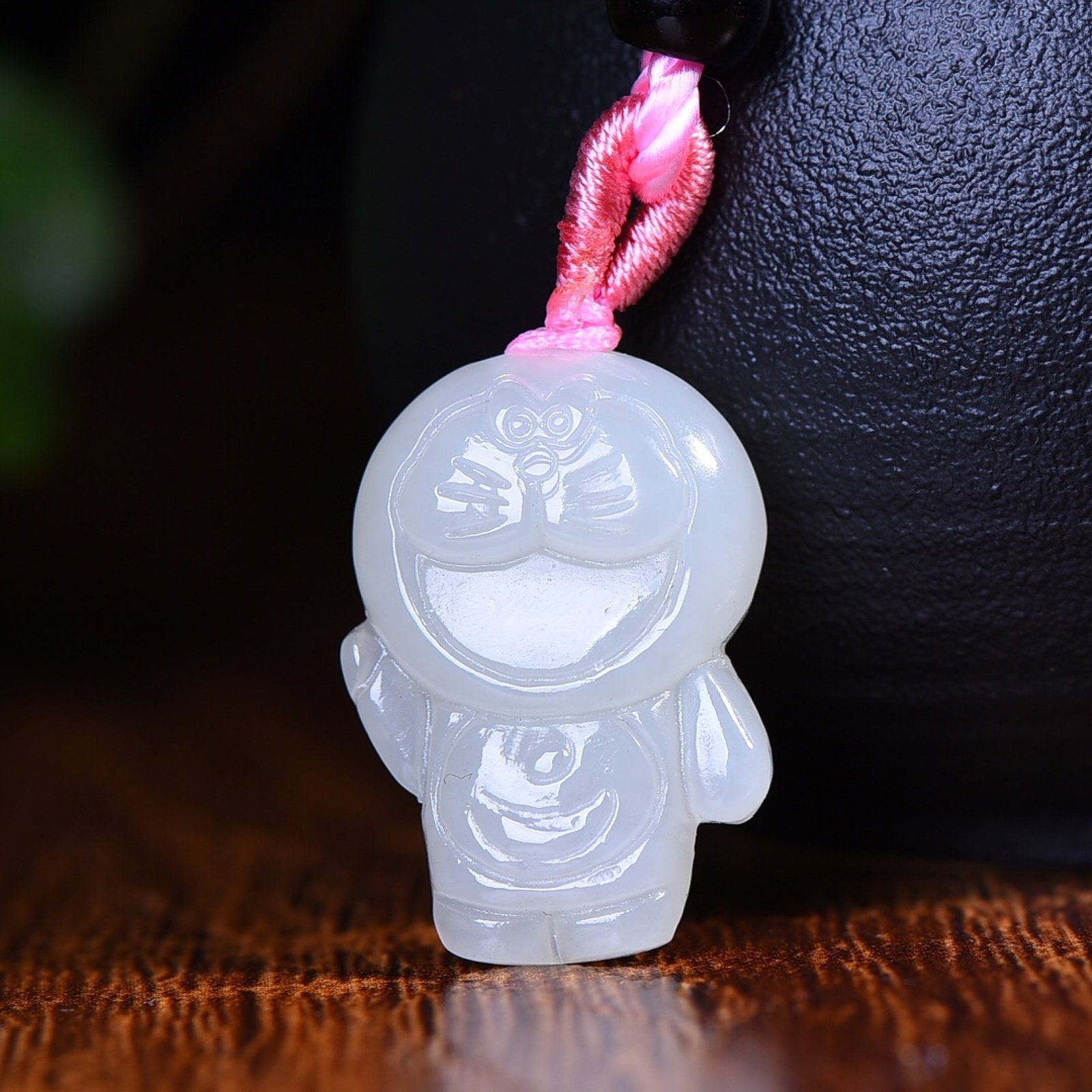 An Exquisite White Jade Doraemon Pendant: An Exquisite White Jade Doraemon Pendant,Size:25mmx17mm (寓意)儿时的回忆中 忠诚的伙伴