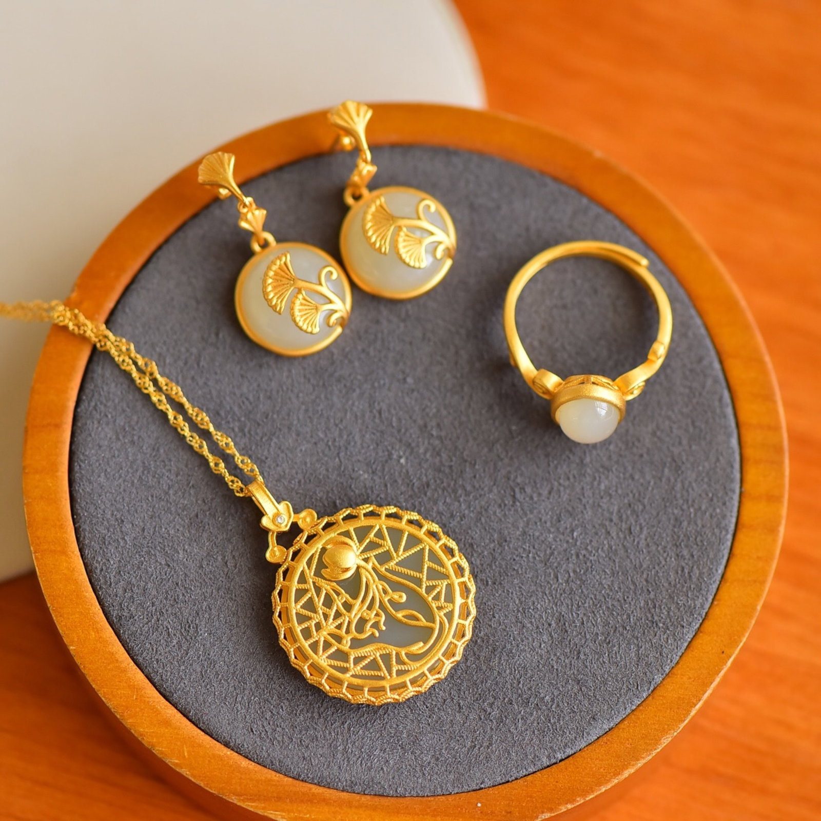 A Set of Fine Sterling Silver-Gold Plated Inlaid White Jade Jewelries: A Set of Fine Sterling Silver-Gold Plated Inlaid White Jade Jewelry,Size:12mmx12mm,20mmx20mm,7mmx9mm 一套纯银镀金镶白玉首饰