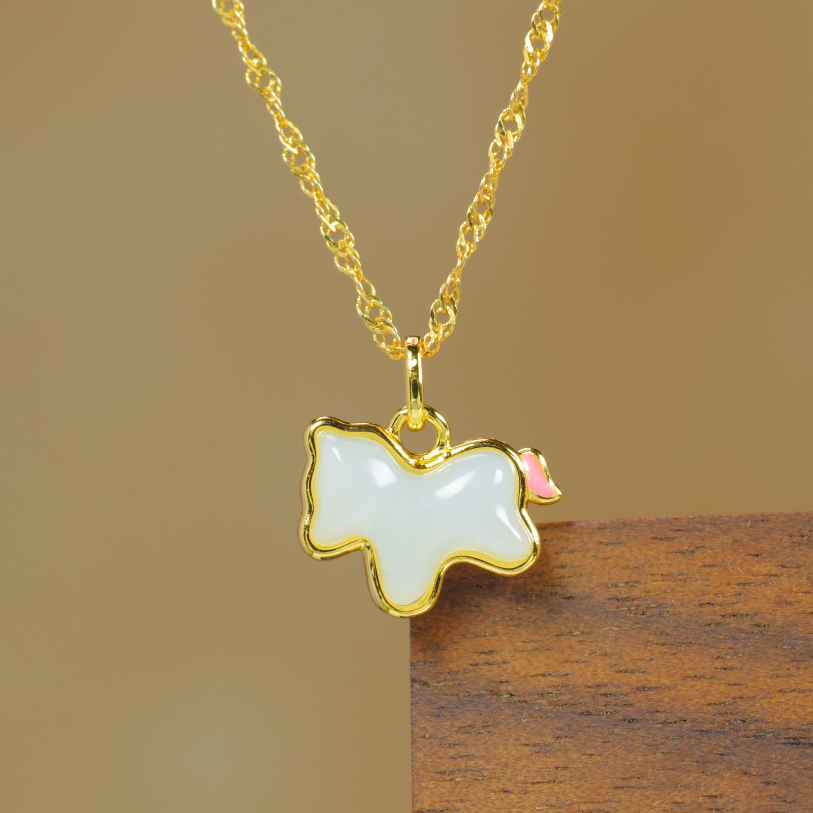 An Exquisite Sterling Silver-Gold Plated Inlaid White Jade Enamel Pendant: Sterling Silver-Gold Plated Inlaid White Jade Enamel Pendant , Size :9mmx10mm 纯银镀金镶白玉珐琅吊坠,尺寸:9mmx10mm