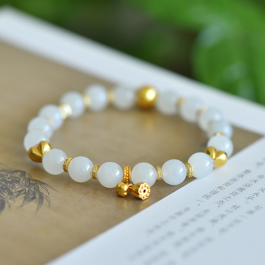 An Exquisite Sterling Silver-Gold Plated White Jade Bracelets: An Exquisite Sterling Silver-Gold Plated White Jade Bracelets 纯银镀金镶白玉手串