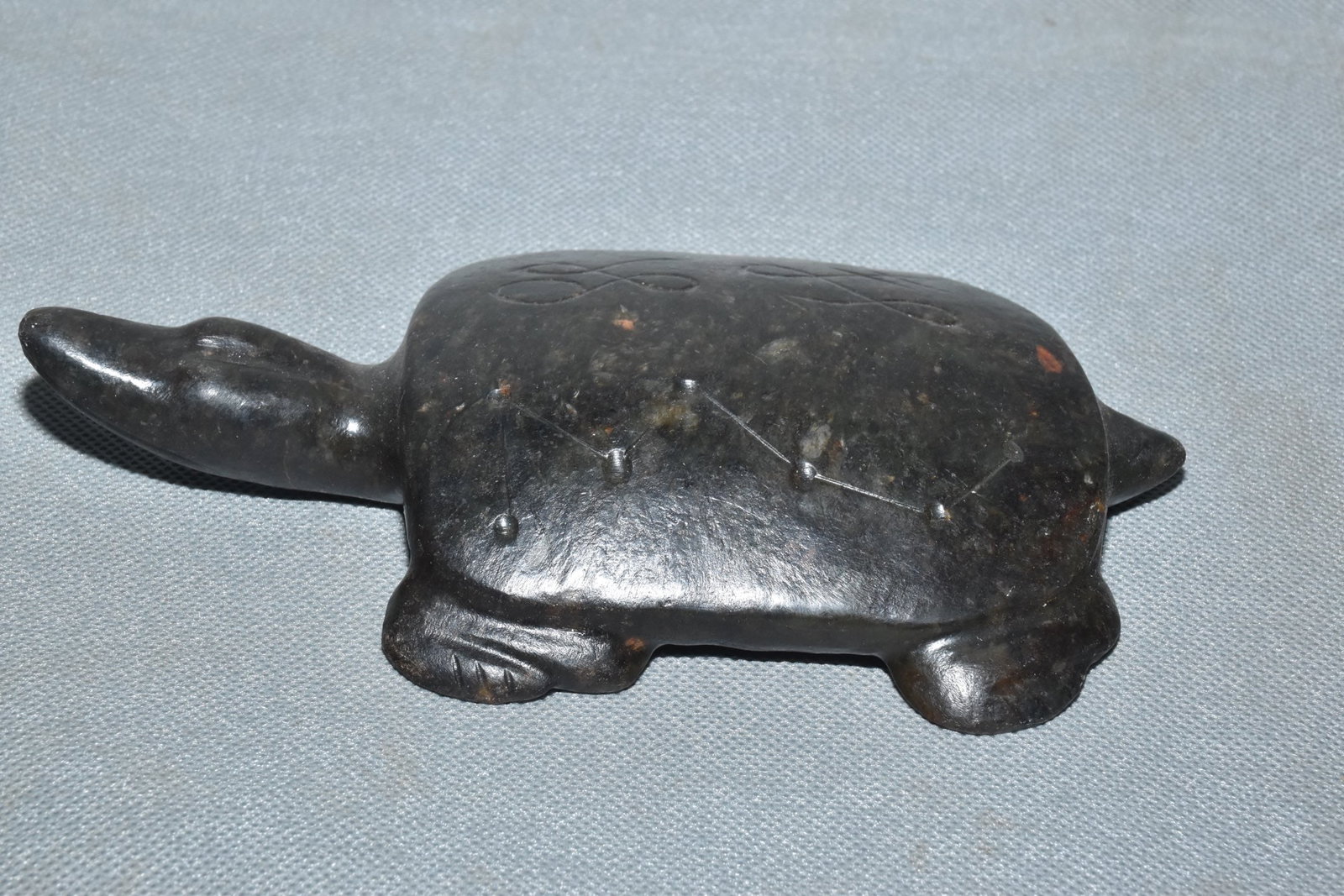 A Fine Black Jade Tortoise Ornament With Star Patterns: A Fine Black Jade Tortoise Ornament With Star Patterns,Hongshan Culture,Dimensions:7.1inx 3.9in,Weight:600g,墨玉星纹玉龟摆件,红山文
